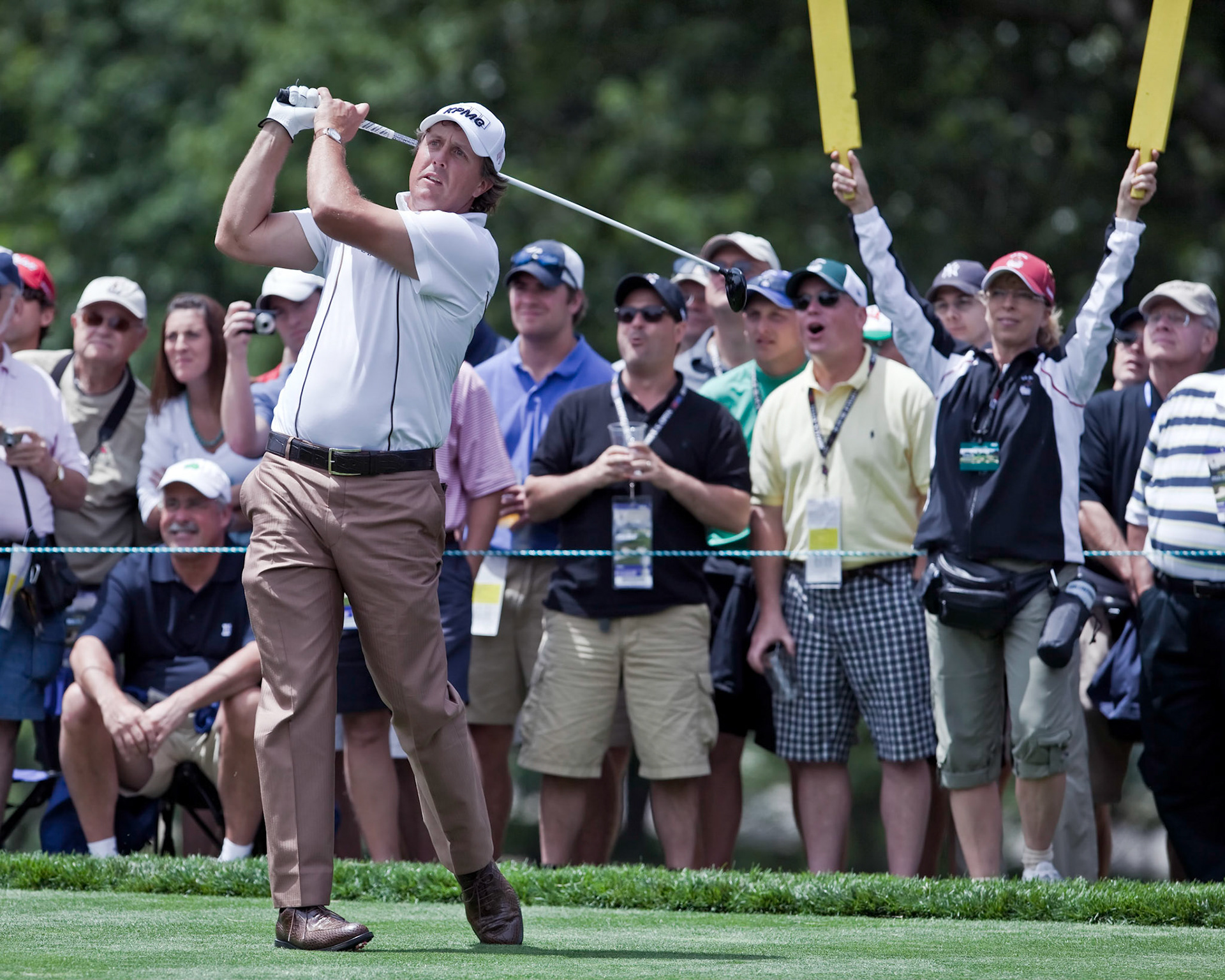 FARMINGDALE, NY - JUNE 17: Spectators enjoy watching Phil Mickelson hit a drive on the second hole at the black course during the 2009 US Open on June 17, 2009 in Farmingdale, NY.