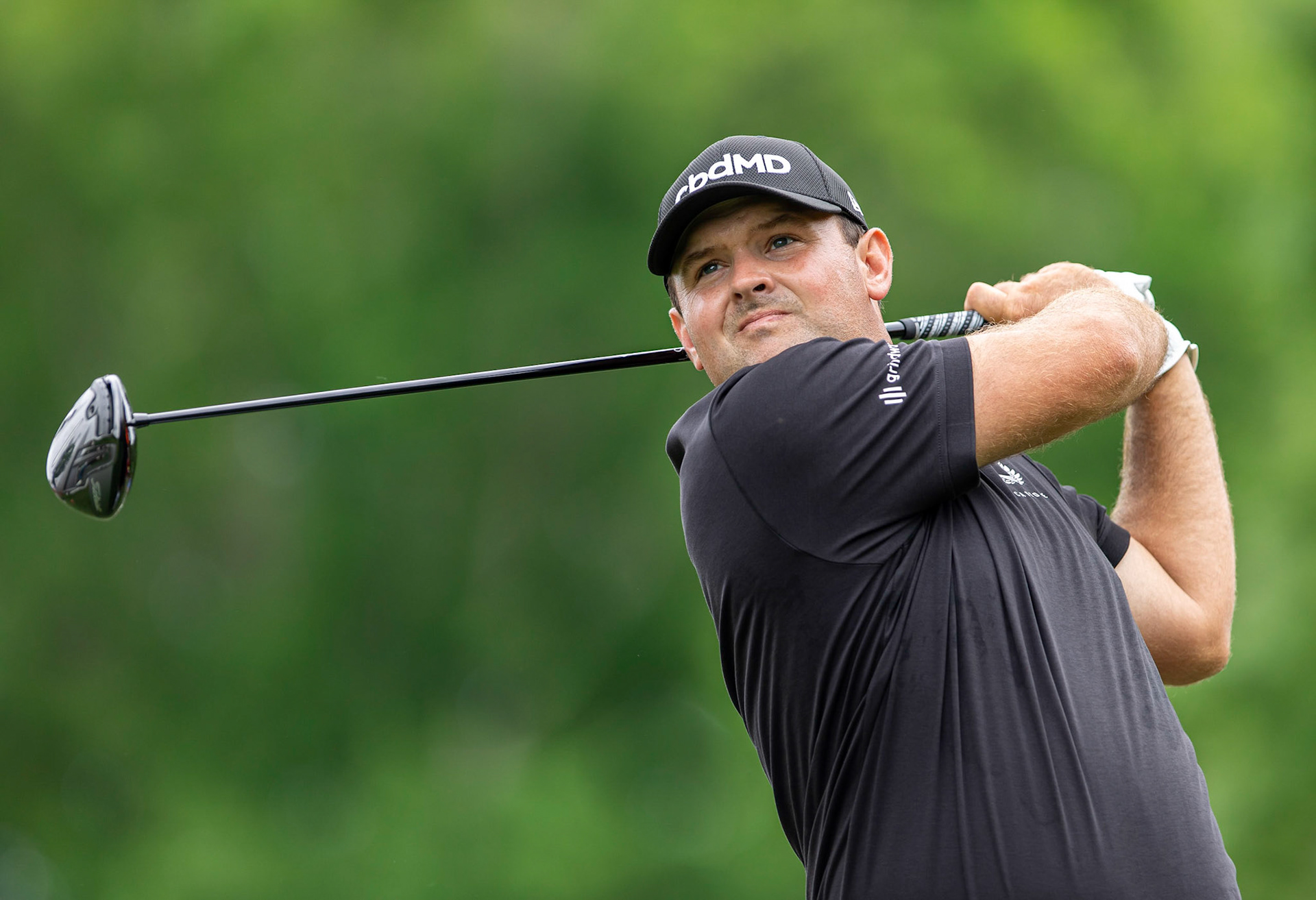 CHARLOTTE, NC , USA  - May 4 , 2021: Patrick Reed hits a drive as he plays in the 2021 Wells Fargo Championship.