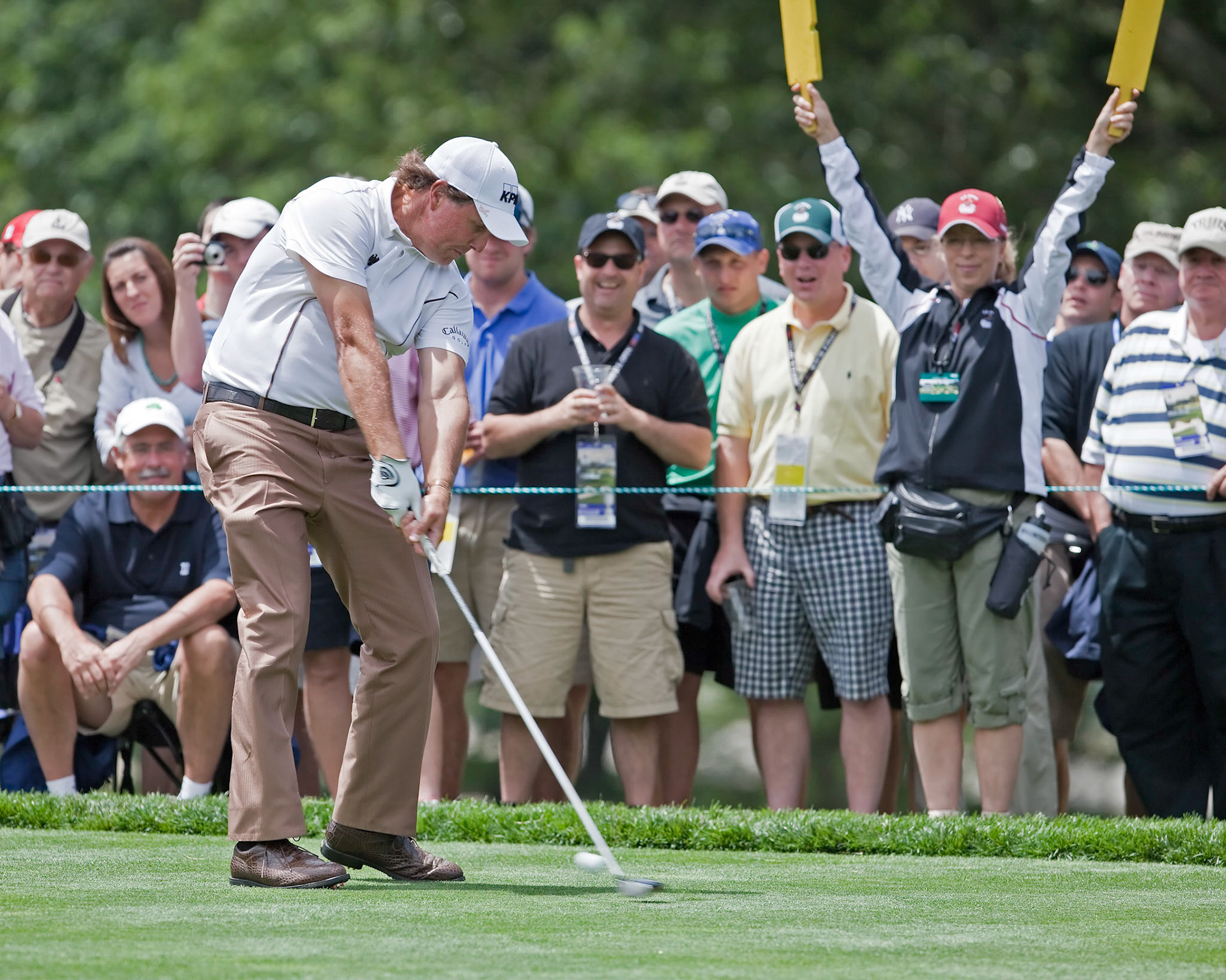 FARMINGDALE, NY - JUNE 17: Spectators enjoy watching Phil Mickelson hit a drive on the second hole at the black course during the 2009 US Open on June 17, 2009 in Farmingdale, NY.