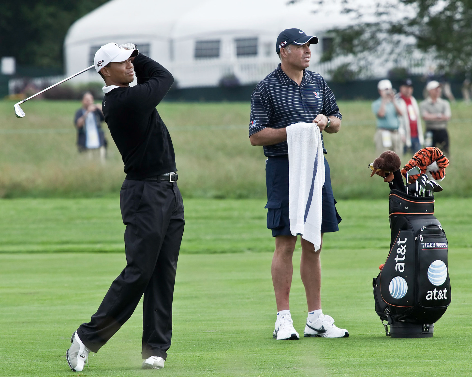 FARMINGDALE, , NY - JUNE 16: Tiger Woods and his caddy watch his second shot on the 16th hole on the Black Course during the 2009 US Open on June 16, 2009 in Farmingdale, NY.