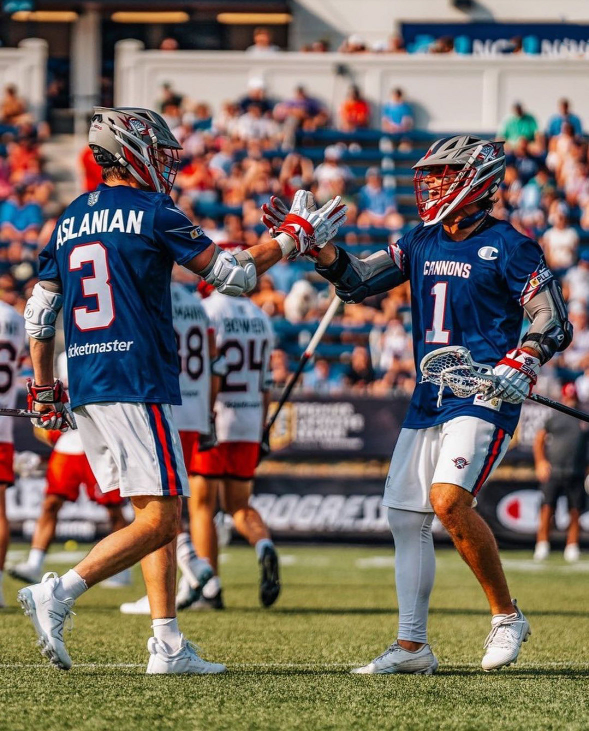 Action shot of team during season wearing main navy jersey