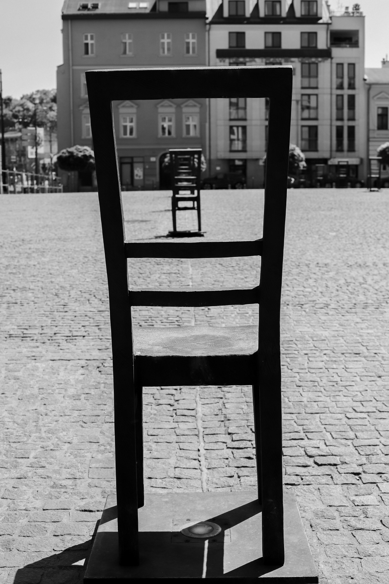 The Square of Empty Chairs in Krakow is a Memorial to the People who died in the German Nazi Extermination Camps The chairs are strategically placed in the direction of which crematoriums the Jews from Krakow were taken to. Each chair represented one thousand people who were taken to their deaths.