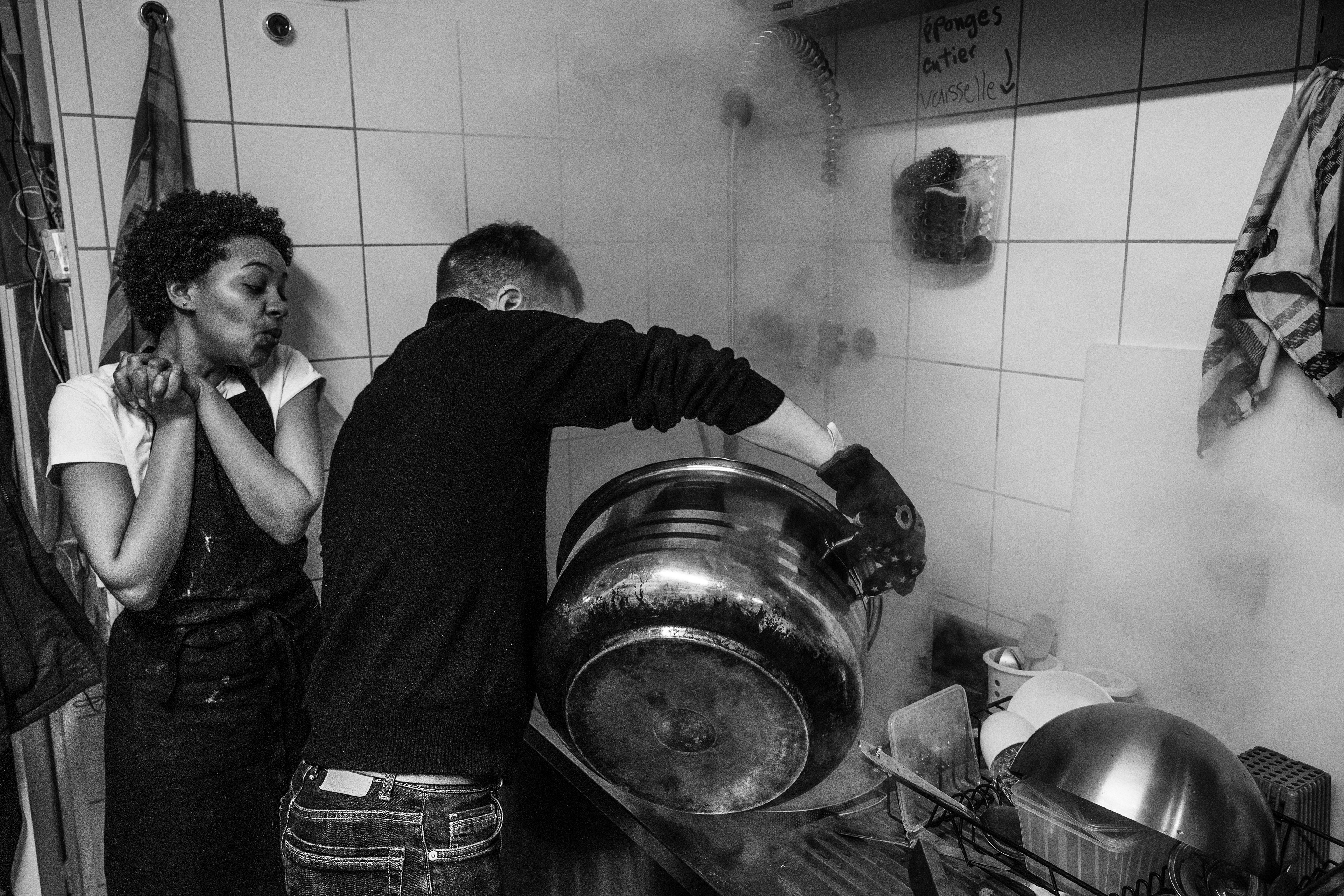 Maram Hussein and Nathan are draining pasta as they prepare for the lunch service at Darna – a former Syrian canteen – on 12 December 2025, in Montreuil, France.