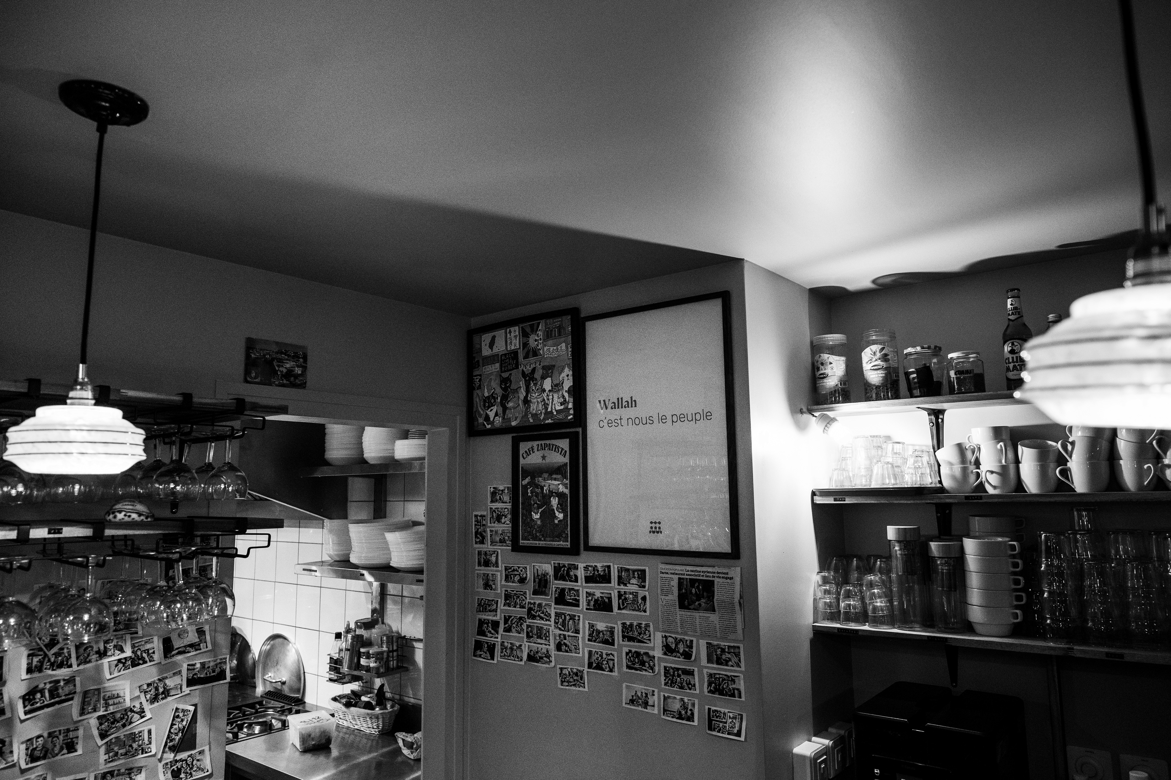 A framed poster bearing the inscription ‘Wallah, we are the people’ can be seen at the Darna canteen – formerly the Syrian Canteen – on 12 December 2025 in Montreuil, France.