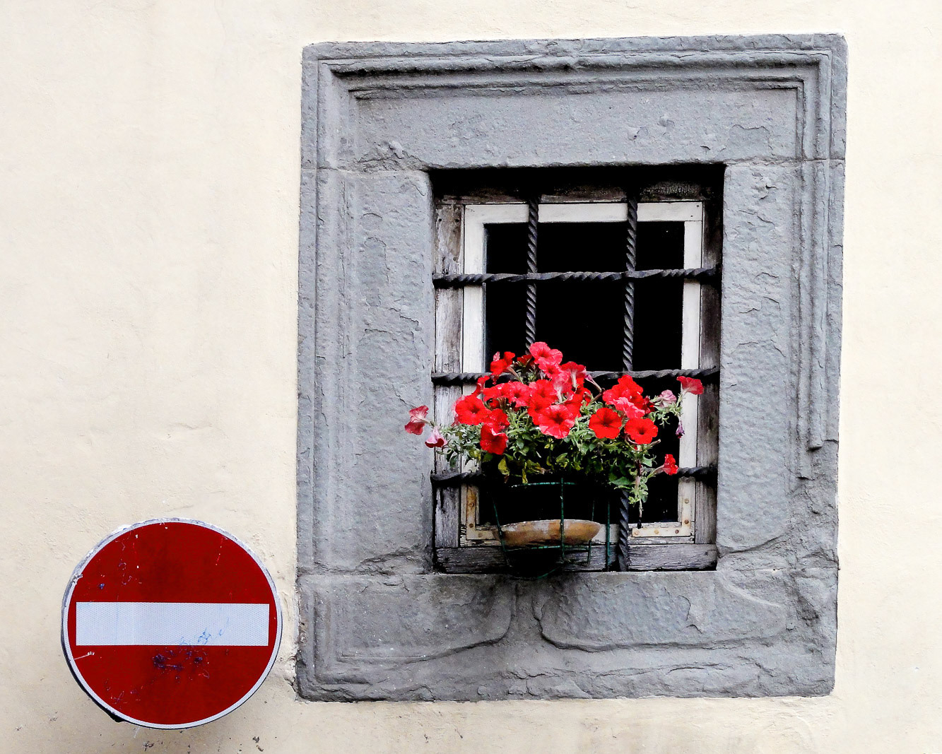 Hold That Pose - Castiglion, Italy. Beautifully flowered window boxes are omnipresent in Italy.