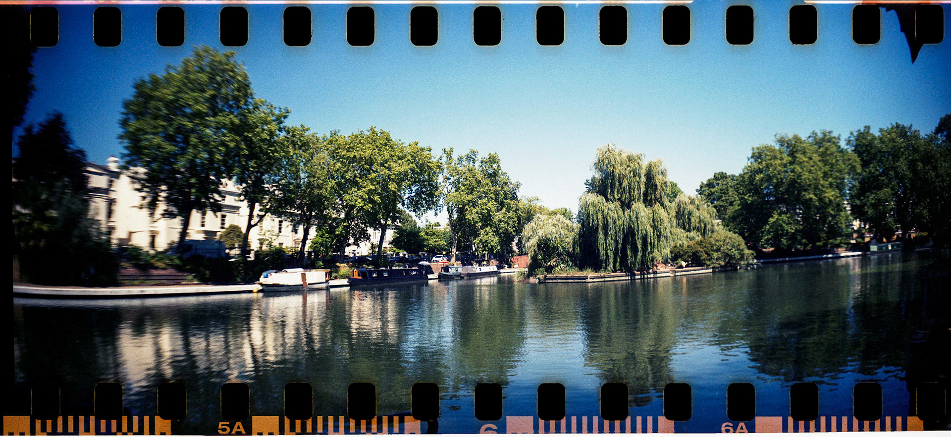 I took an Lomograohy Sprocket Rocket out for a walk around London and was not disappointed - it exposes the entire height of the 35mm film, including the sprocket holes leading to a really lovely effect.