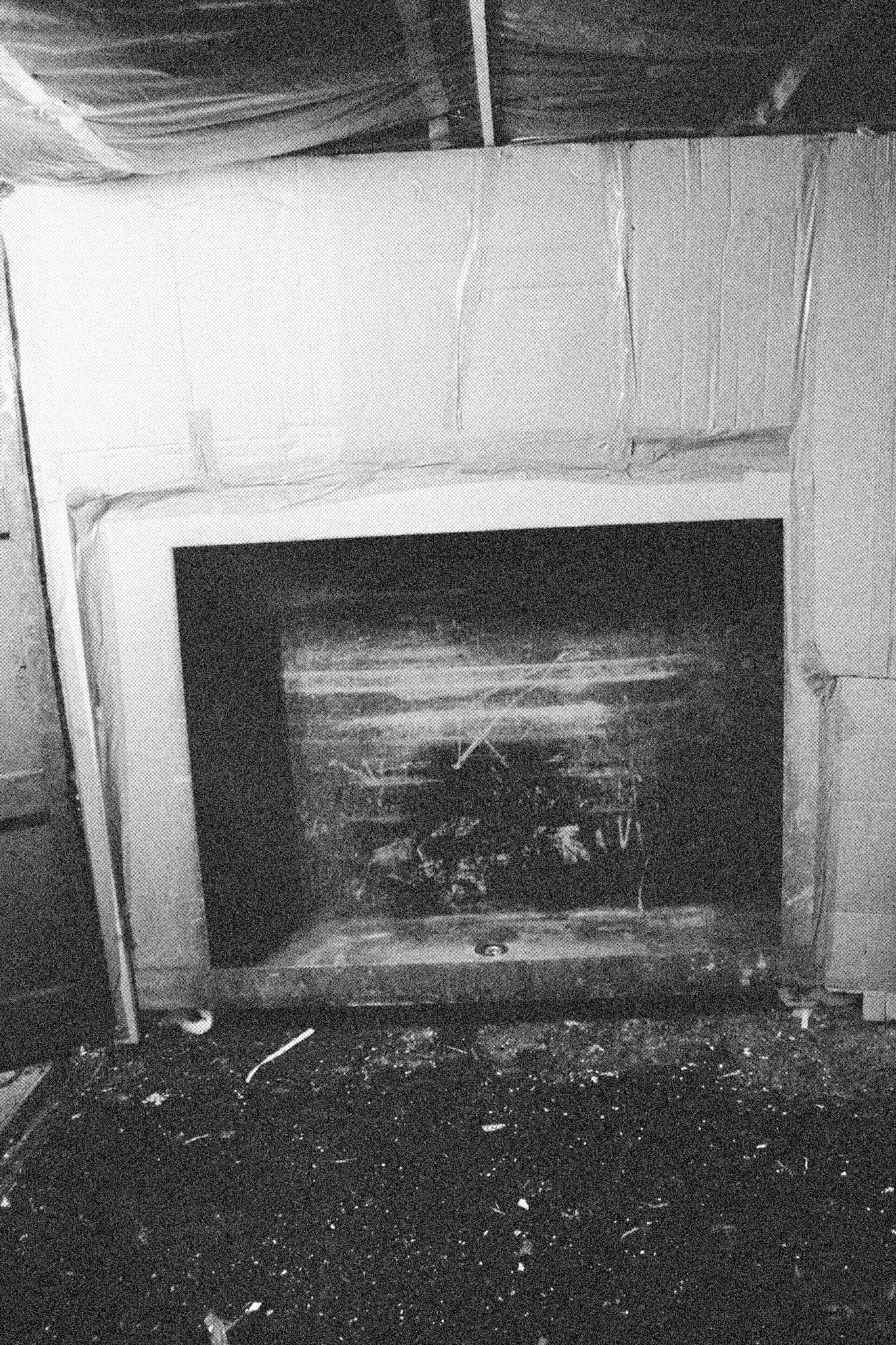 Reconstructed Constructioninstallationcardboard on wooden construction, silk screened wallpaper, tiled floor, carpet floor, electrical equipment: television, DVD-player, transmitter, lightning, plastic ridge tent, silkscreen materials, copy prints, iron case, bed mattress, buckets of latex paint.2006