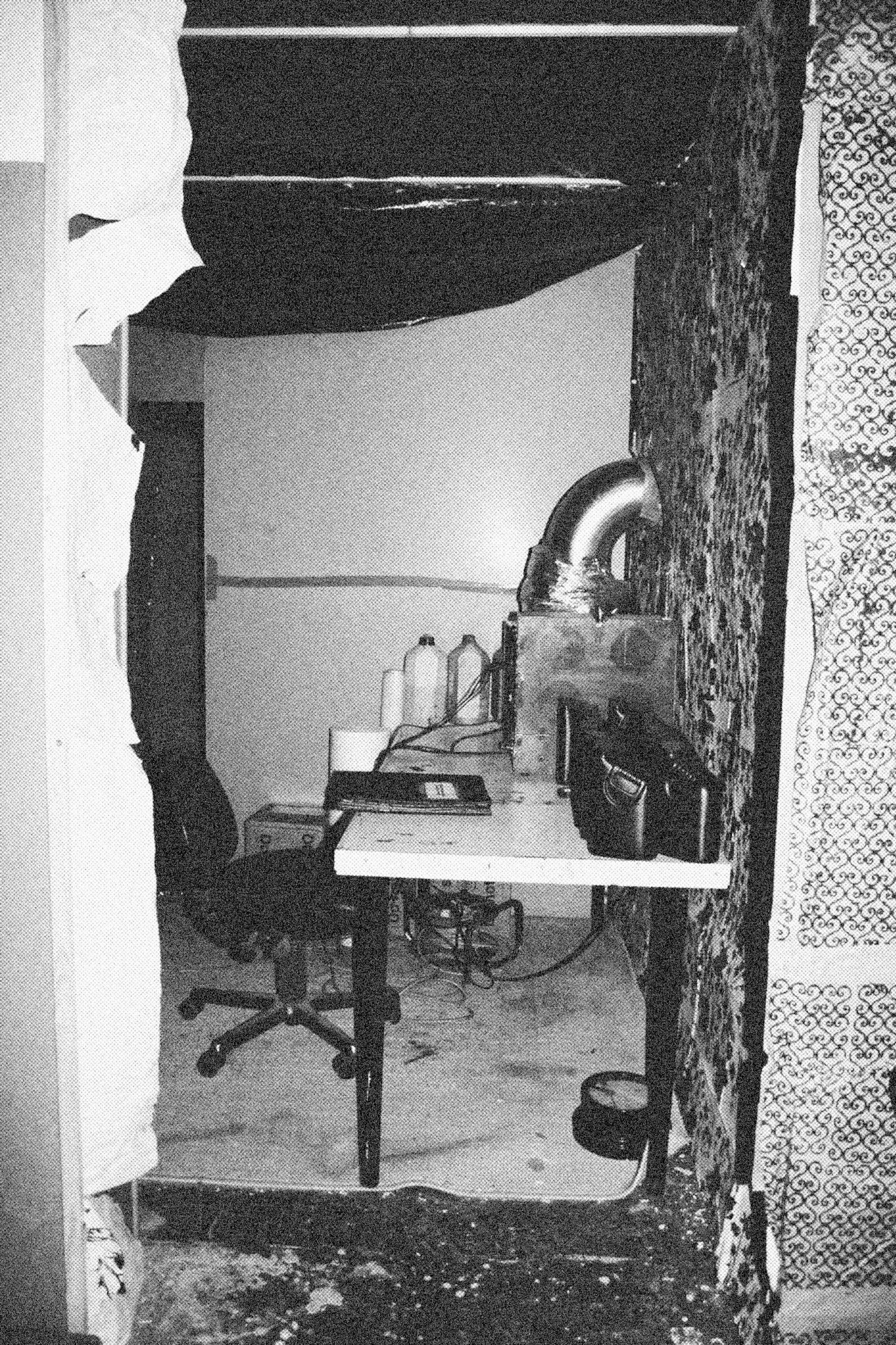 Reconstructed Constructioninstallationcardboard on wooden construction, silk screened wallpaper, tiled floor, carpet floor, electrical equipment: television, DVD-player, transmitter, lightning, plastic ridge tent, silkscreen materials, copy prints, iron case, bed mattress, buckets of latex paint.2006