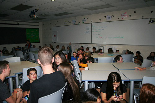 sitting in the dark with your classmats