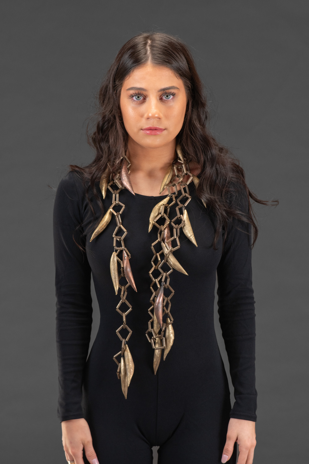 Spicule Necklace IV, 2021, copper, brass, nickel, patina, 73 x 8 x 1 in. (185 x 20 x 2.5 cm), photographed by Professor Robly Glover