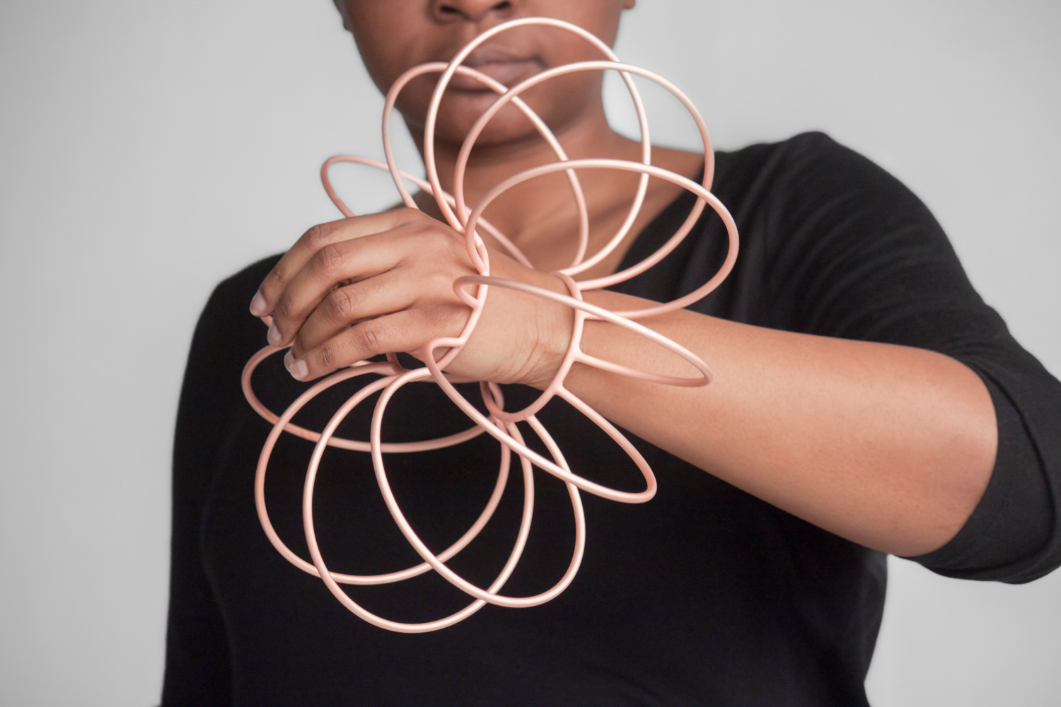Spinning Bracelet, 2023, copper plated brass rods, 11.5 x 11.5 x 4.75 in. (29.25 x 29.25 x 12 cm), photographed by Clayton Salley