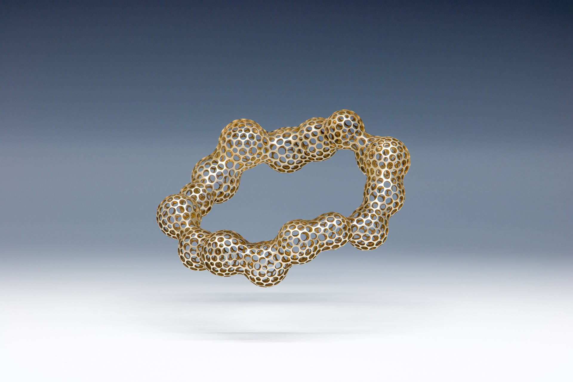 Bracelet F4-1 A2, 2025, 3D printed and cast, bronze, 4.5 x 4 x 1 in. (11.5 x 10 x 3.5 cm), 41 grams, photographed by Clayton Salley