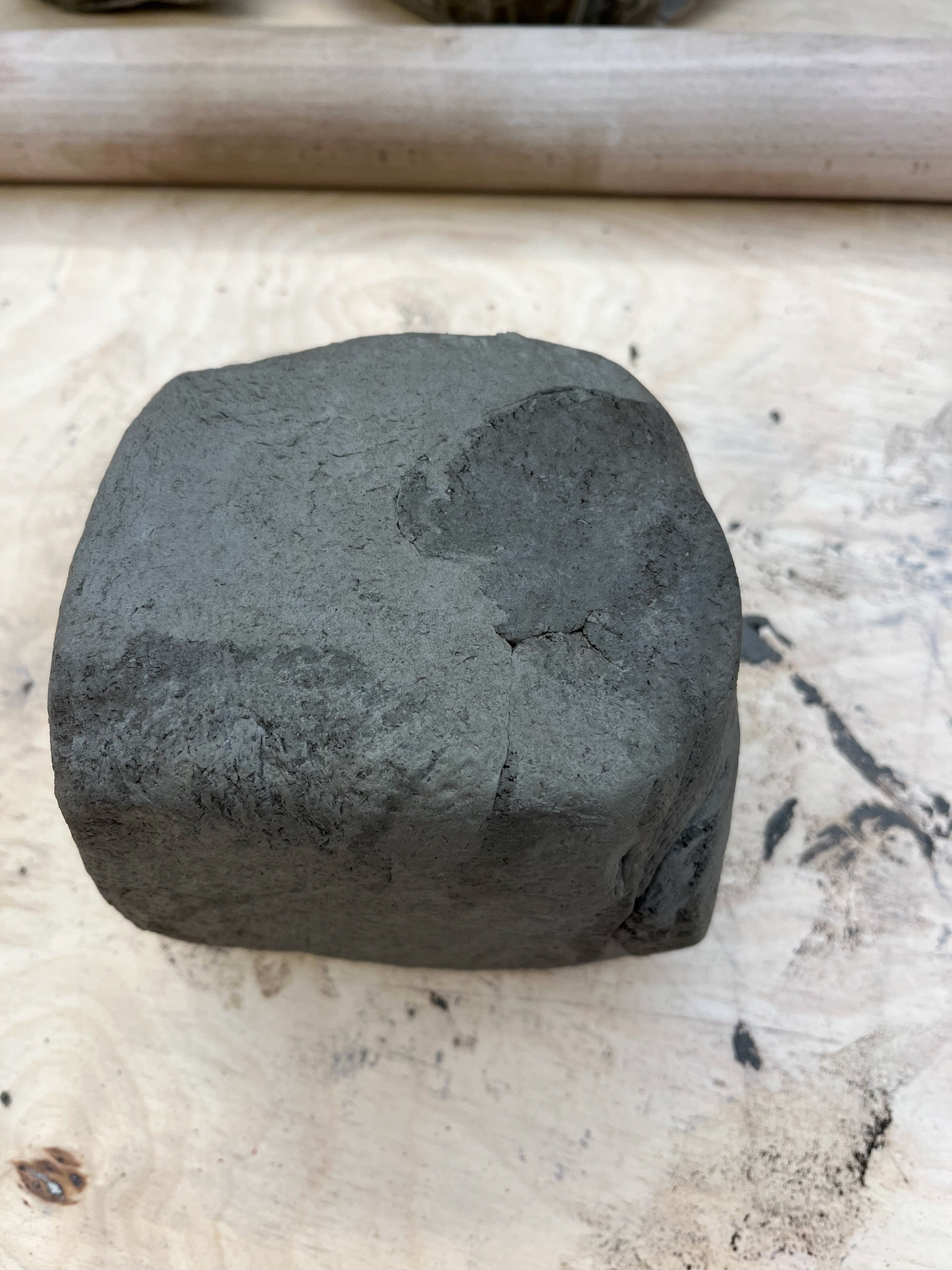Marbled ball of clay before rolling into slabs