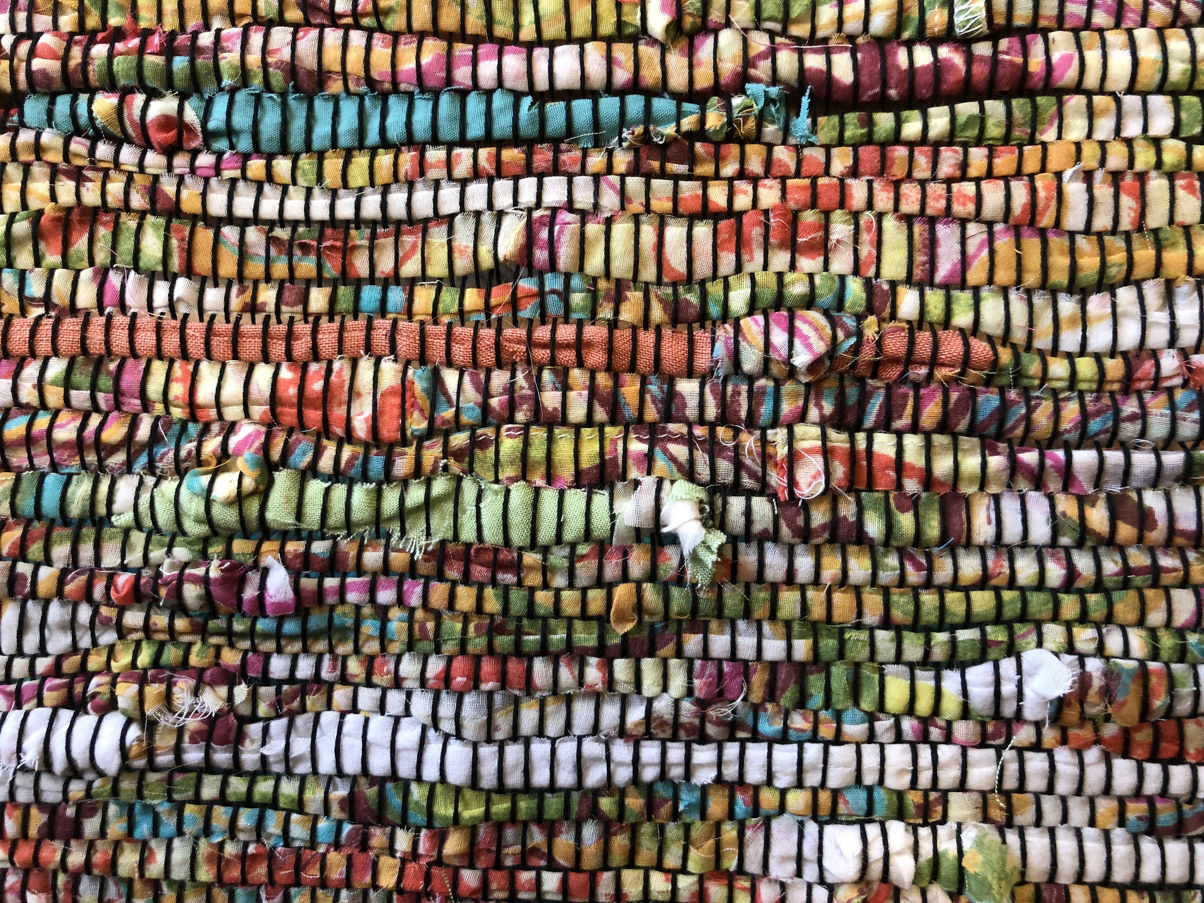 Weaving with clothing items that belonged to a loved one.