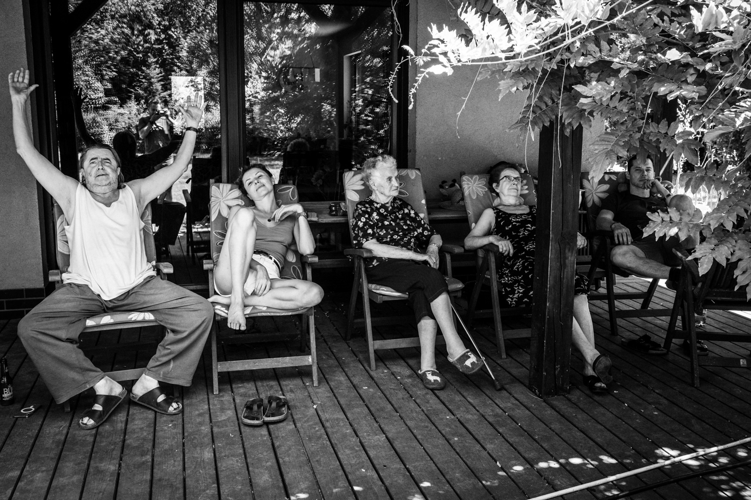 Family gathering on a terrace during a summer evening