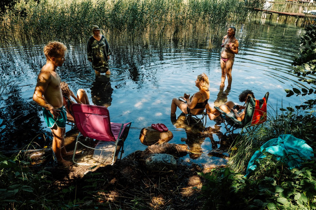 People playing in the lake during a summer afternoon, from the project Only in Summer