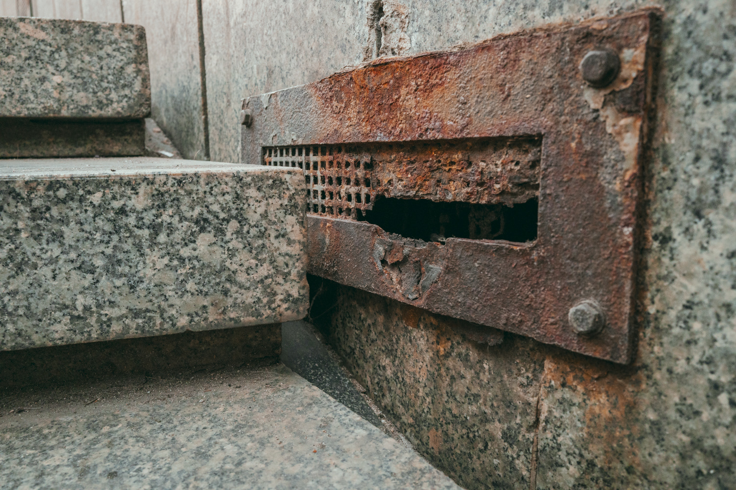 Concrete wall and metal grid in the city, from the project Urban Anatomy