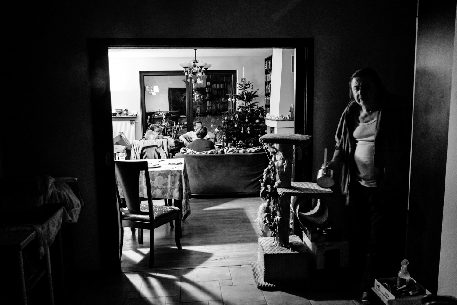 Evening scene inside Wojtek’s home with family