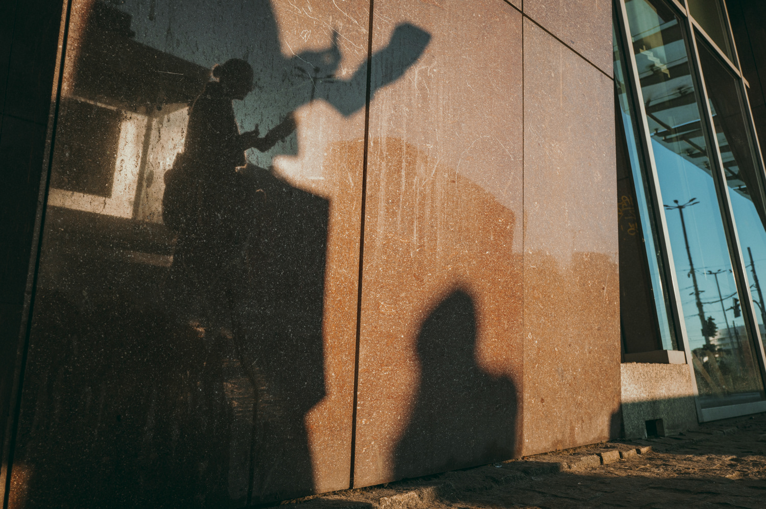 Shadow of a passerby on a city wall, from the project Urban Anatomy