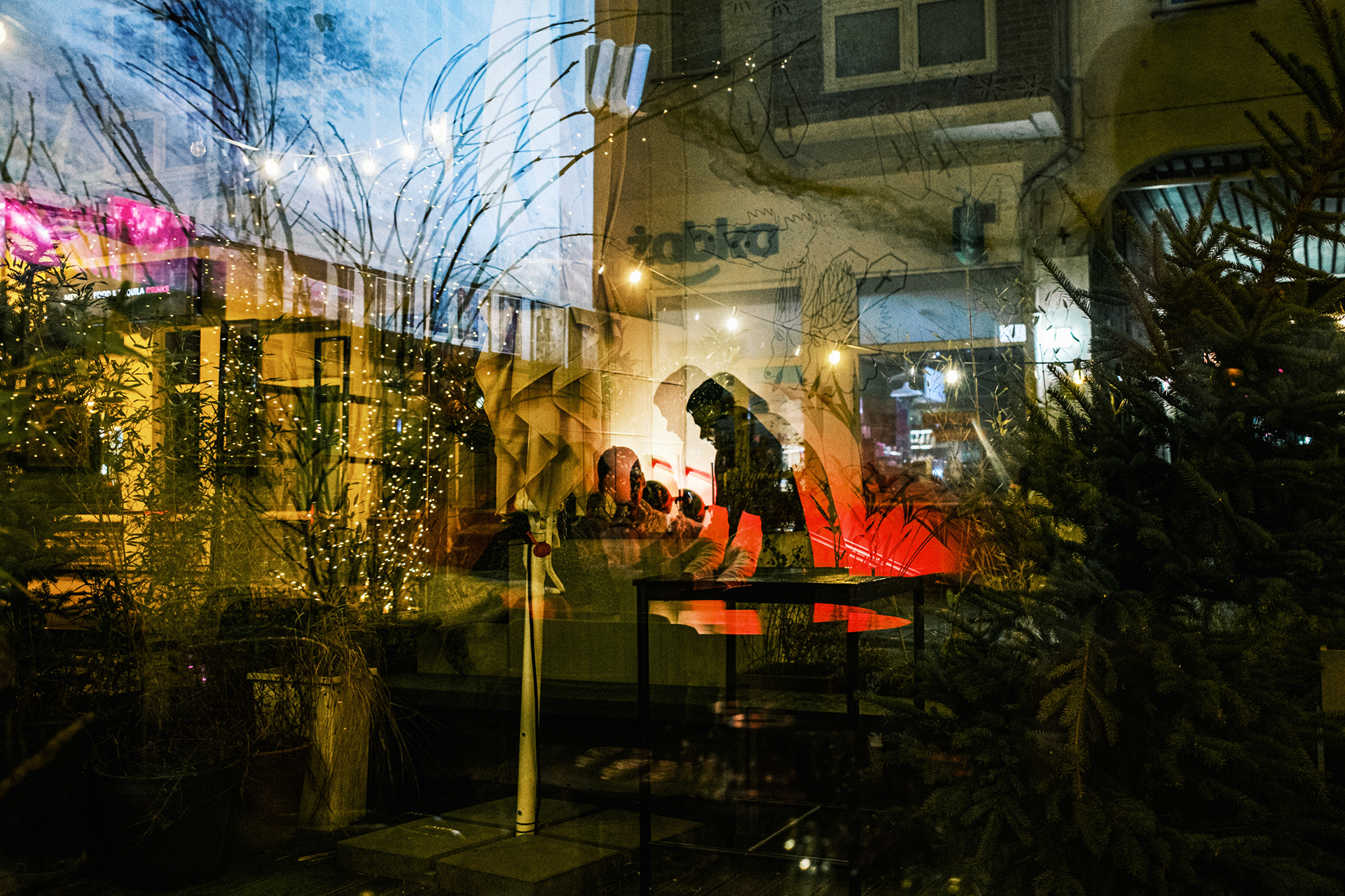 City reflections at night with neon lights