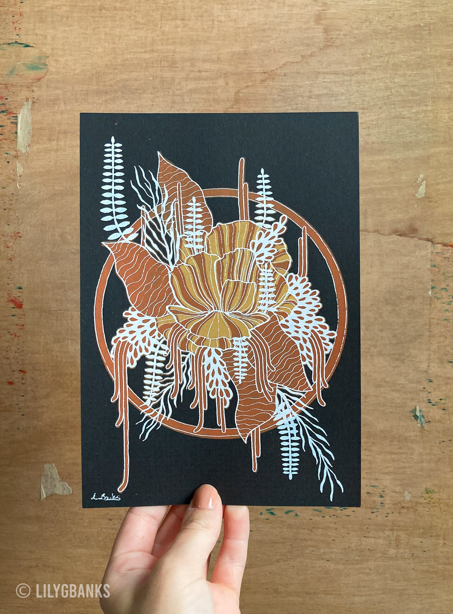 SOLD 3. White, orange & yellow on black paper.