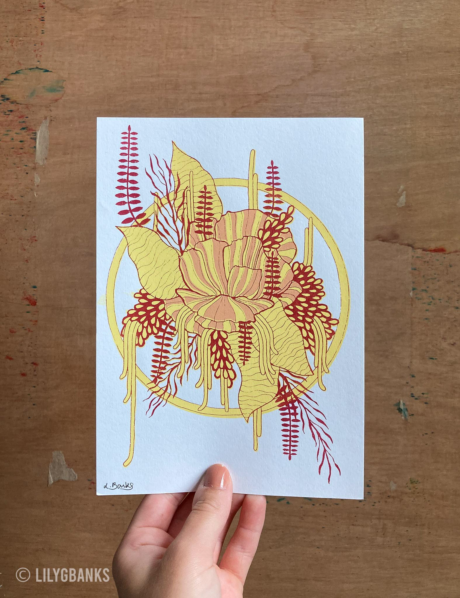 2. Yellow, red & peach on off-white paper.