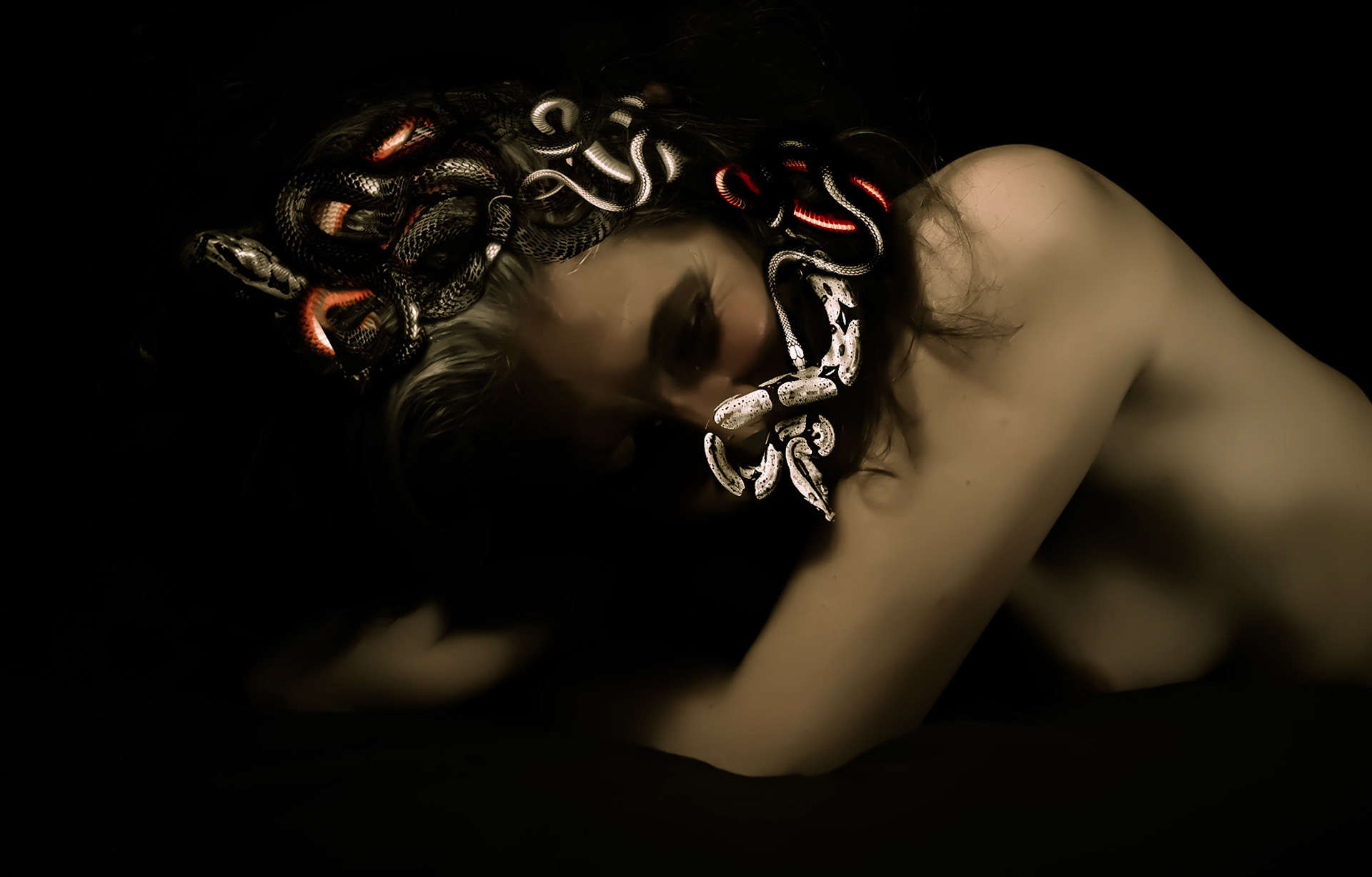 Medusa. Look at me and you'll become stone