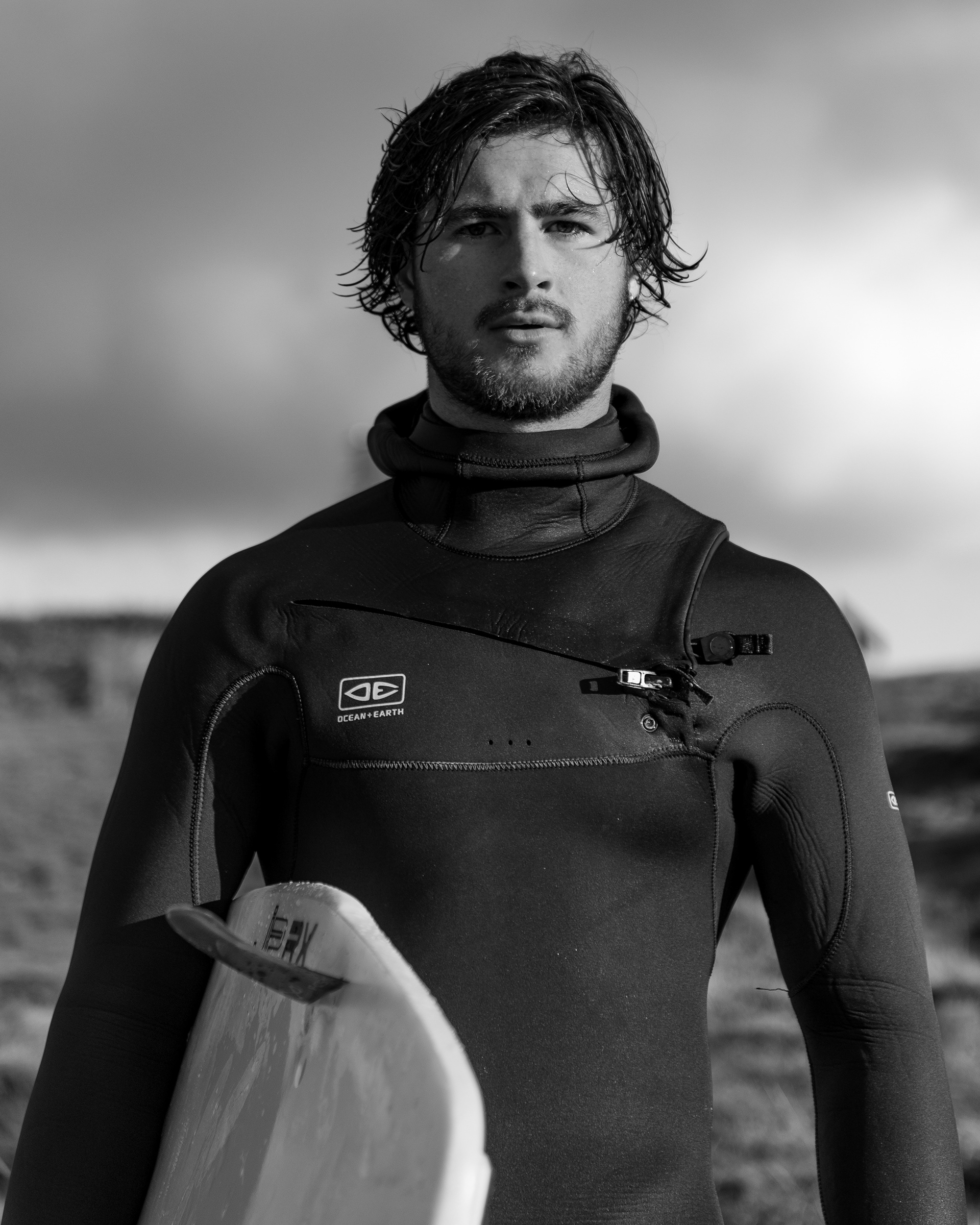 Liam Ross, an intermediate surfer on the sand dunes of Gwithian Towans Beach,  Hayle, Cornwall, UK 30/11/2022 © Simon Shea 2022