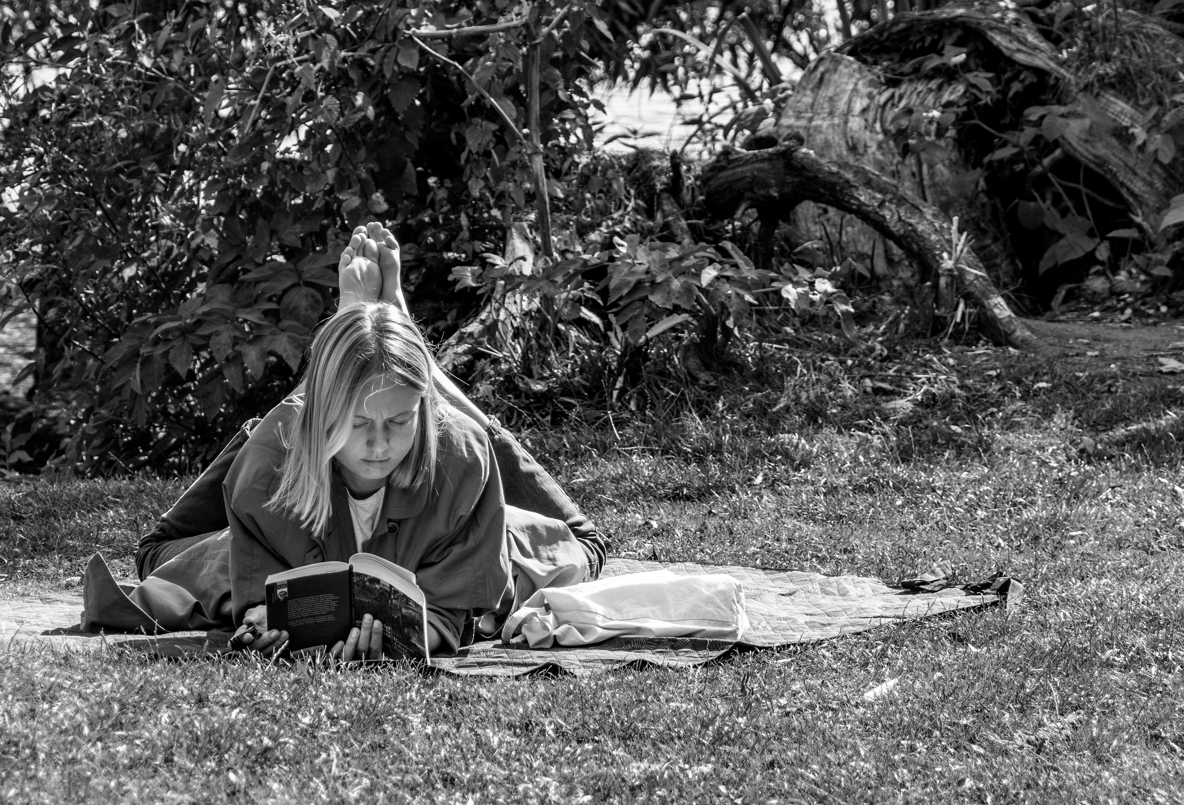 One Hundred Years of Solitude - girl reads book at Alster Lake, Hamburg