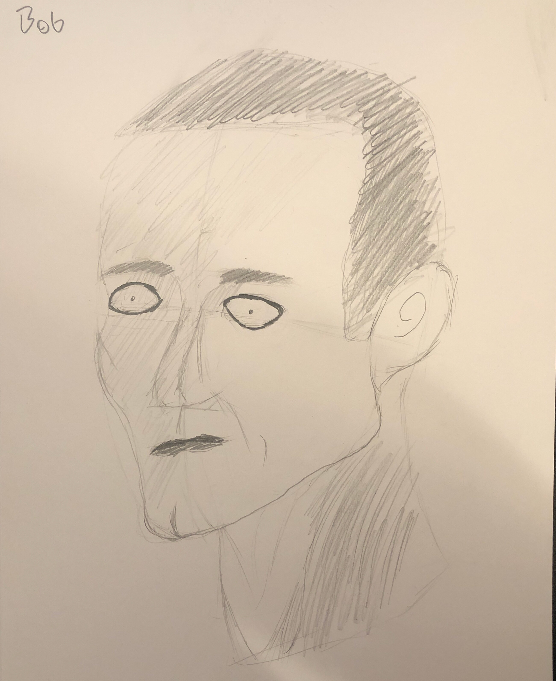 This is Bob. Bob is based on a random person I found in Google Images. Bob got into My Chemical Romance, so he is wearing black eyeliner and lipstick.