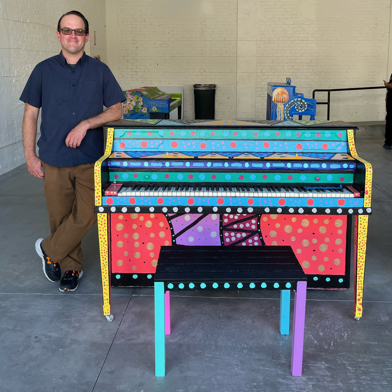 John McGrath with his completed piano