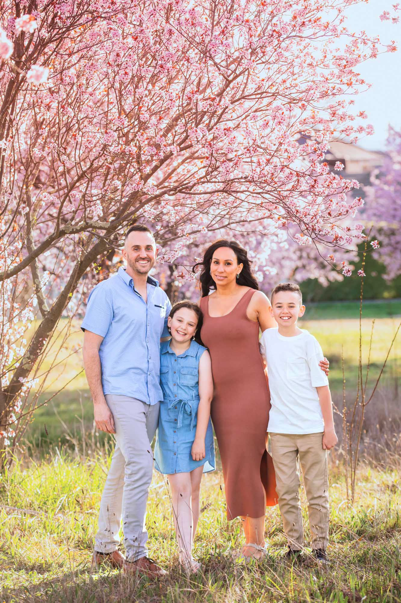 Spring family photo session in the cherry blossoms in Canberra. © Olia Photography