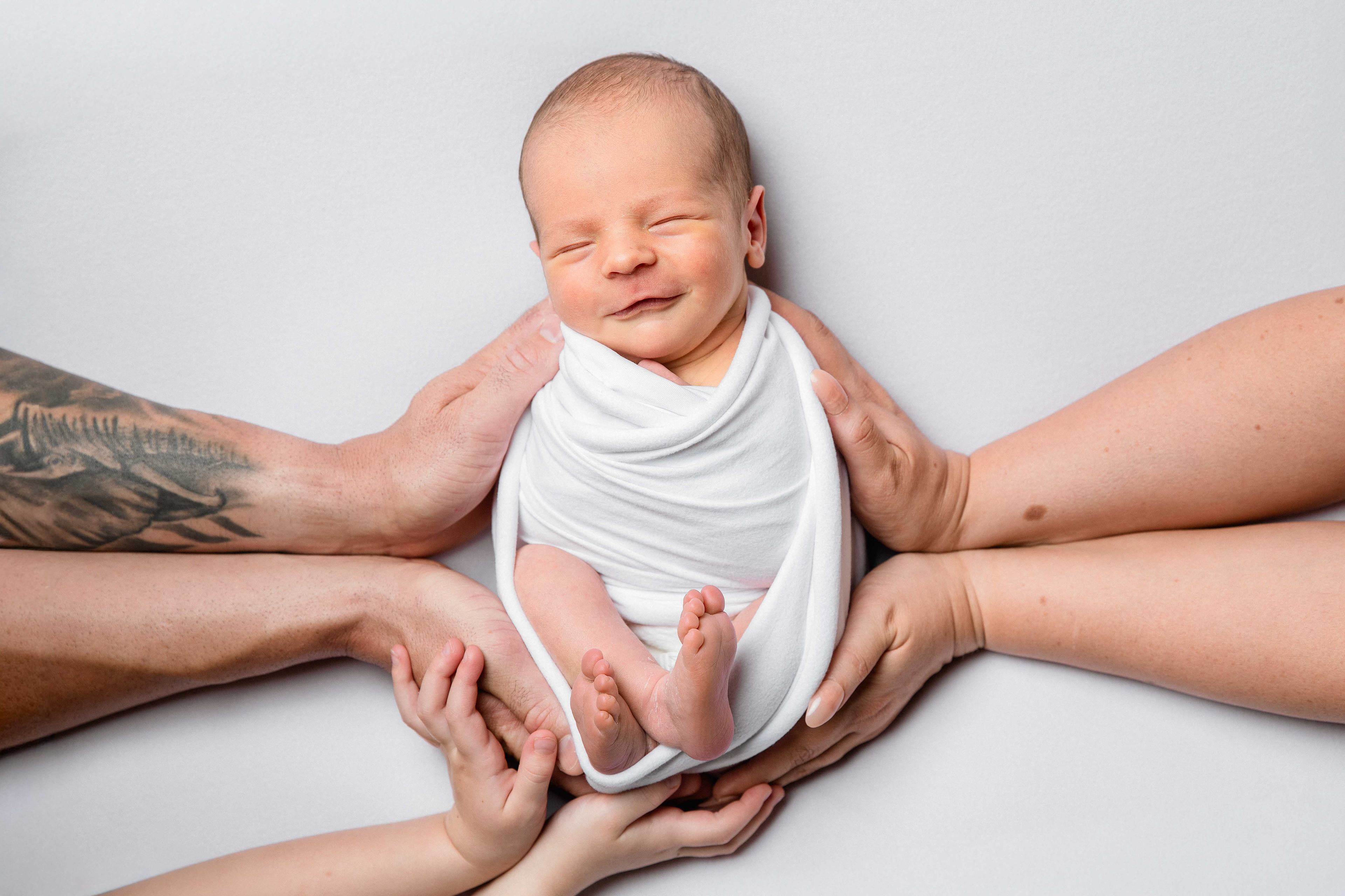 Newborn photo session in Canberra. Captured by Olia Photography.