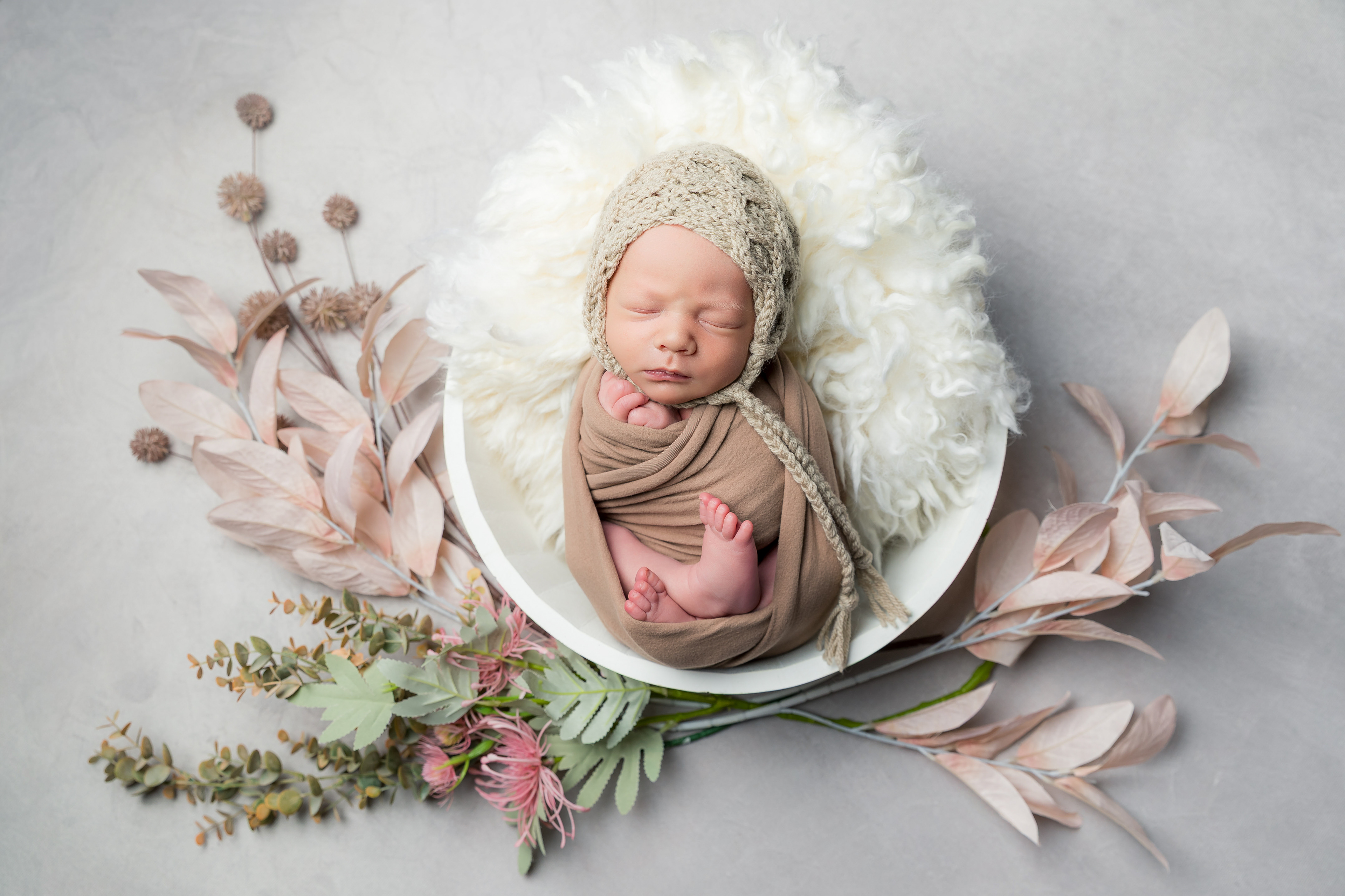 Newborn baby portrait session in Canberra captured by Olia Photography, specializing in professional maternity, newborn, and family photography.