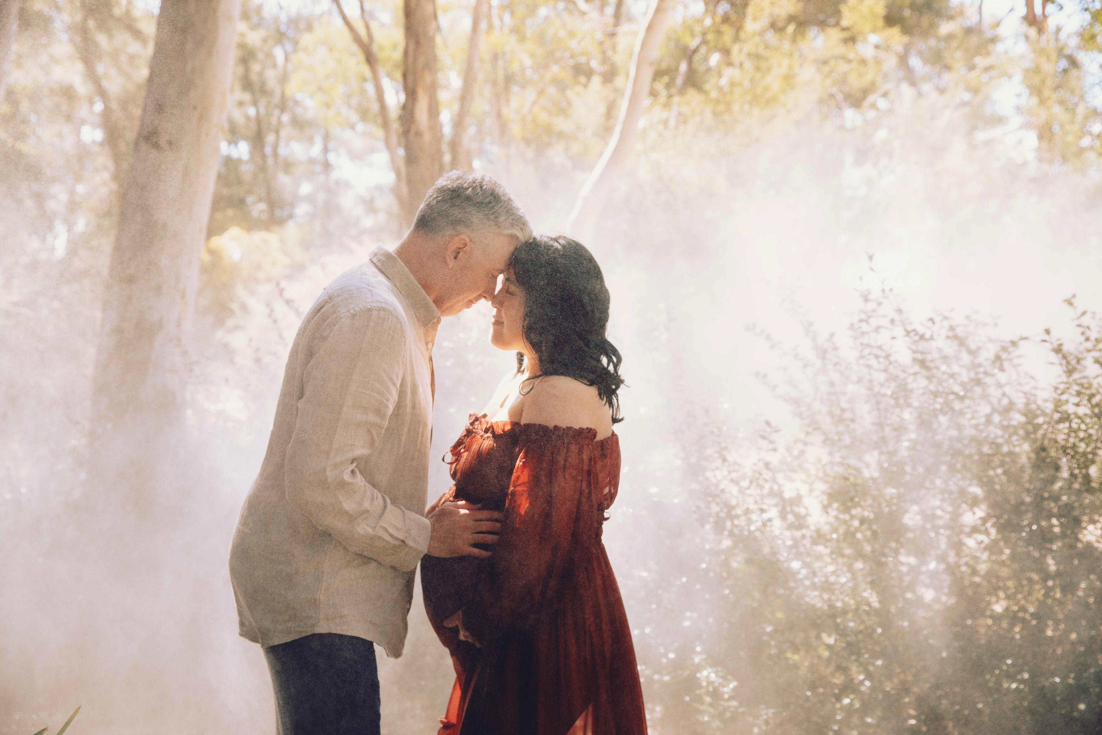 Beautiful outdoor maternity photoshoot in Canberra featuring an expecting mother, captured by professional photographer Olia Photography, specializing in pregnancy and newborn photography, creating timeless and natural portraits for moms-to-be.