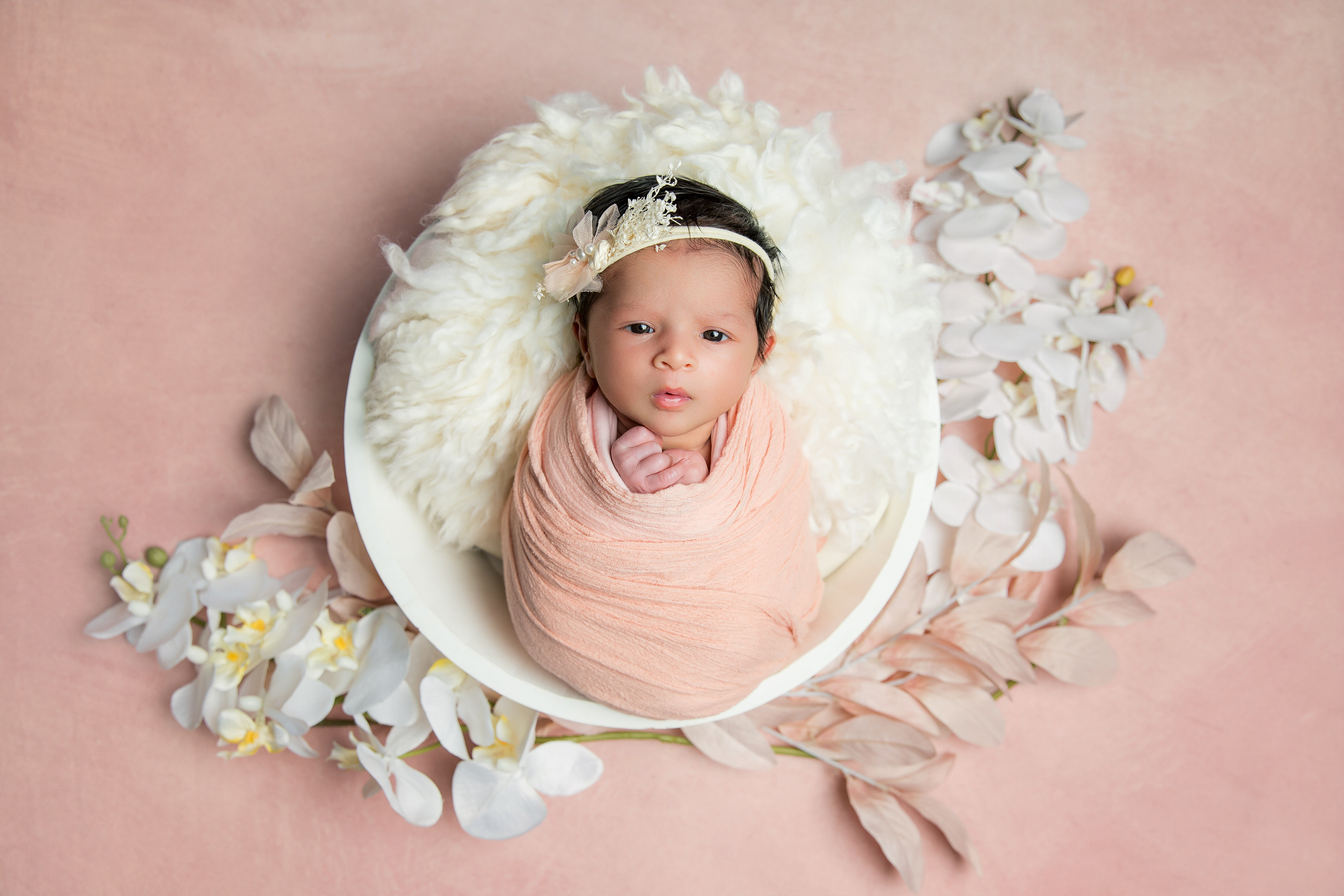 Newborn baby portrait session in Canberra captured by Olia Photography, specializing in professional maternity, newborn, and family photography.