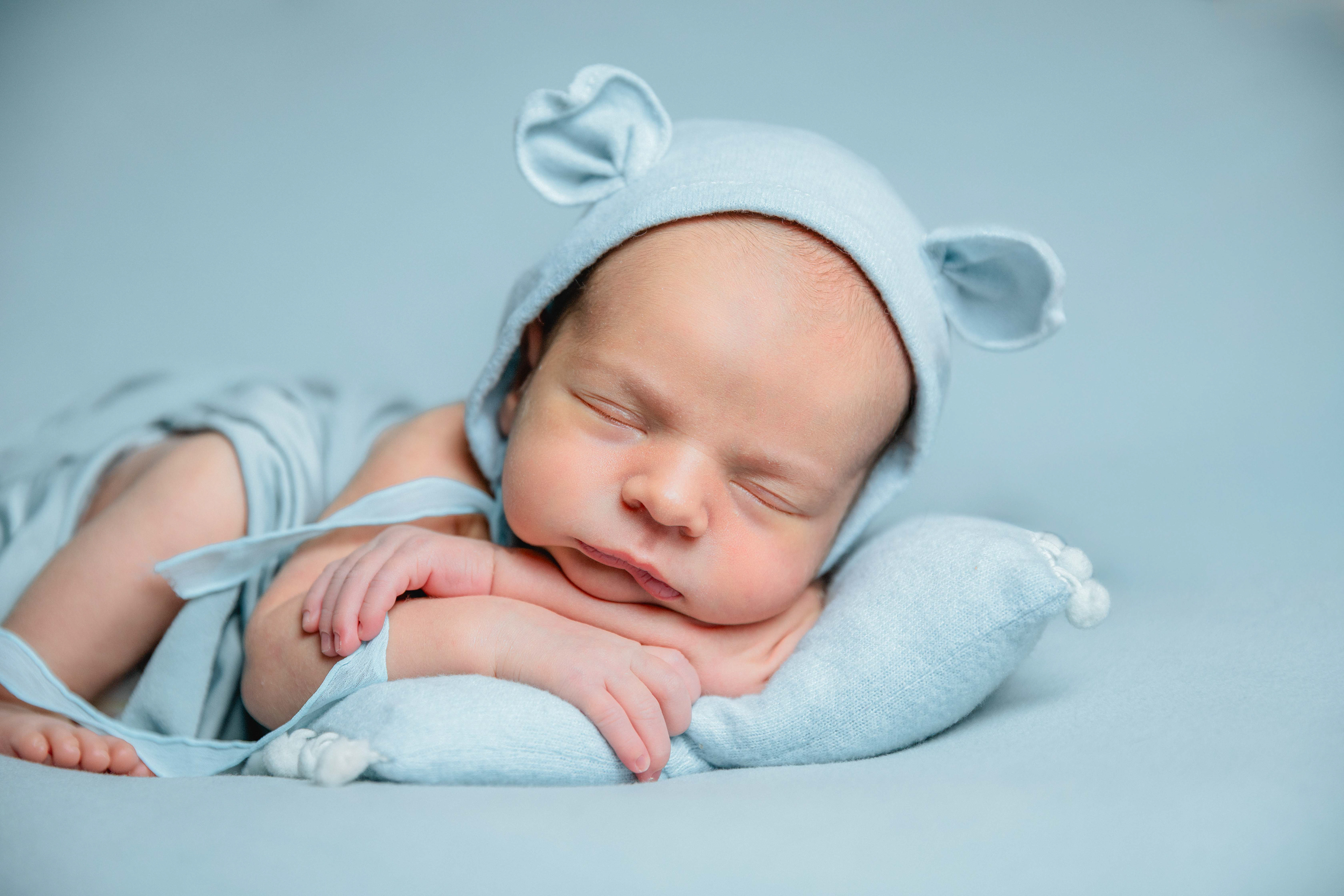Newborn photo session in Canberra. Captured by Olia Photography.
