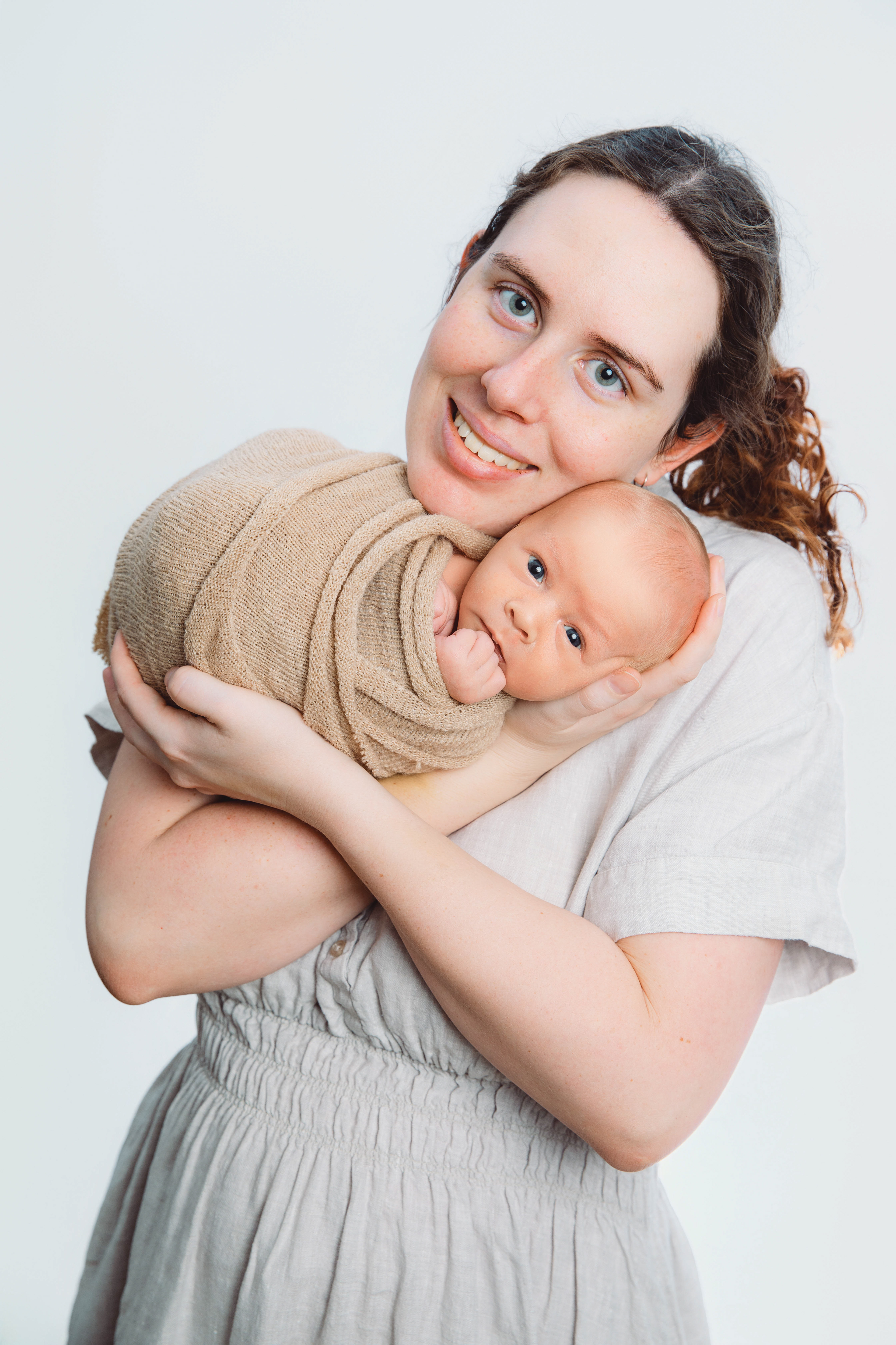 Newborn baby portrait session in Canberra captured by Olia Photography, specializing in professional maternity, newborn, and family photography.