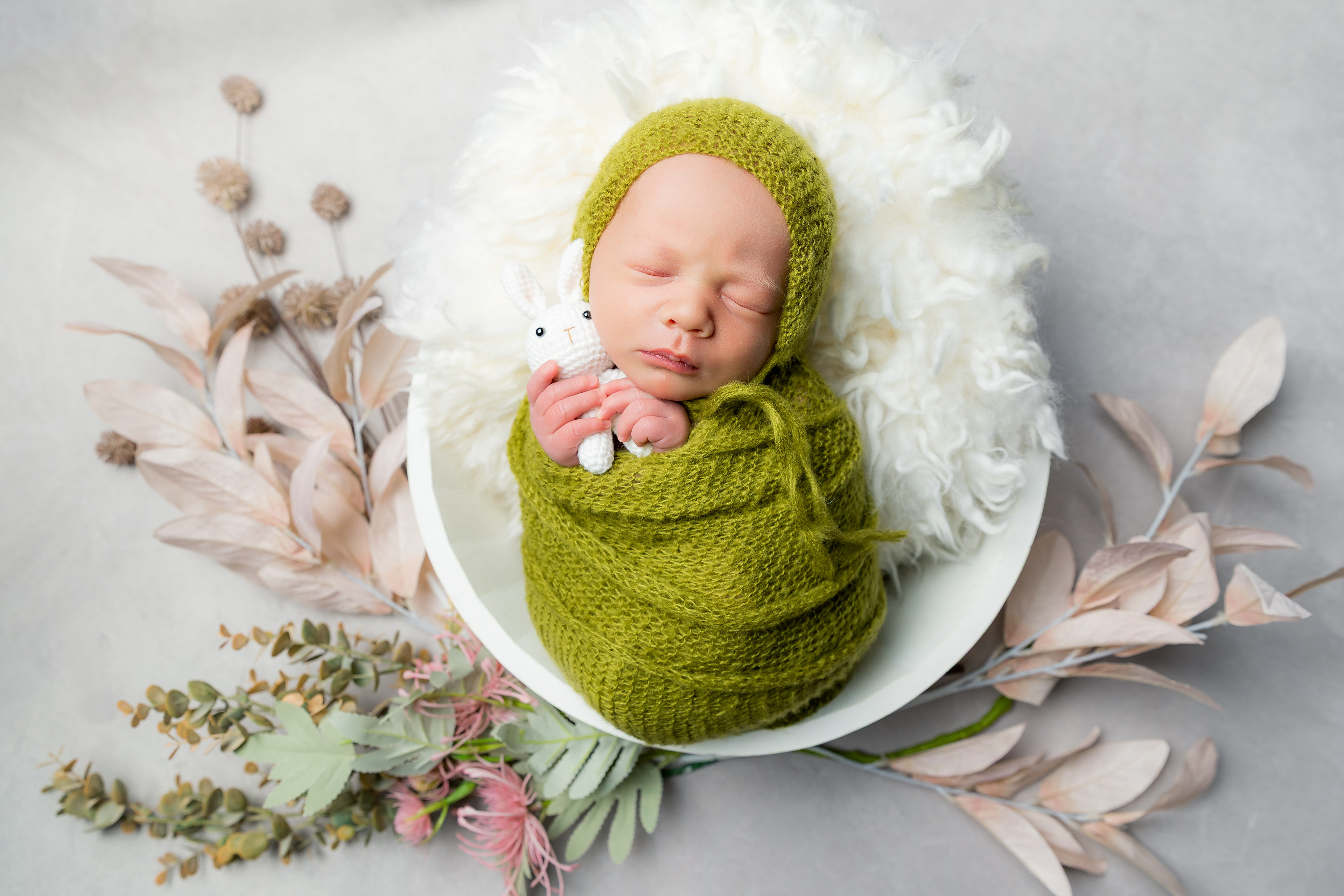 Newborn baby portrait session in Canberra captured by Olia Photography, specializing in professional maternity, newborn, and family photography.