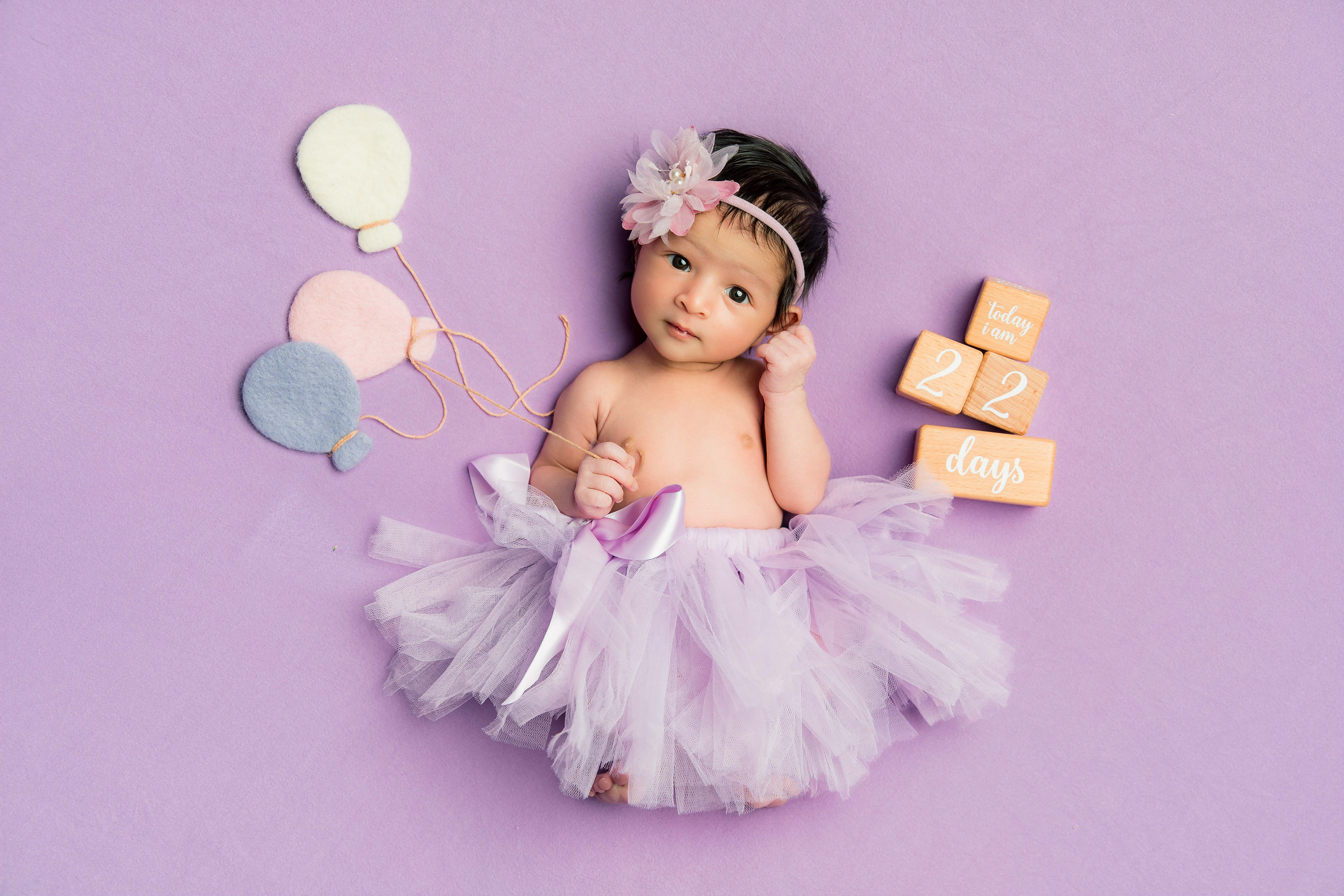 Mobile Newborn baby portrait session in Canberra by Olia Photography.