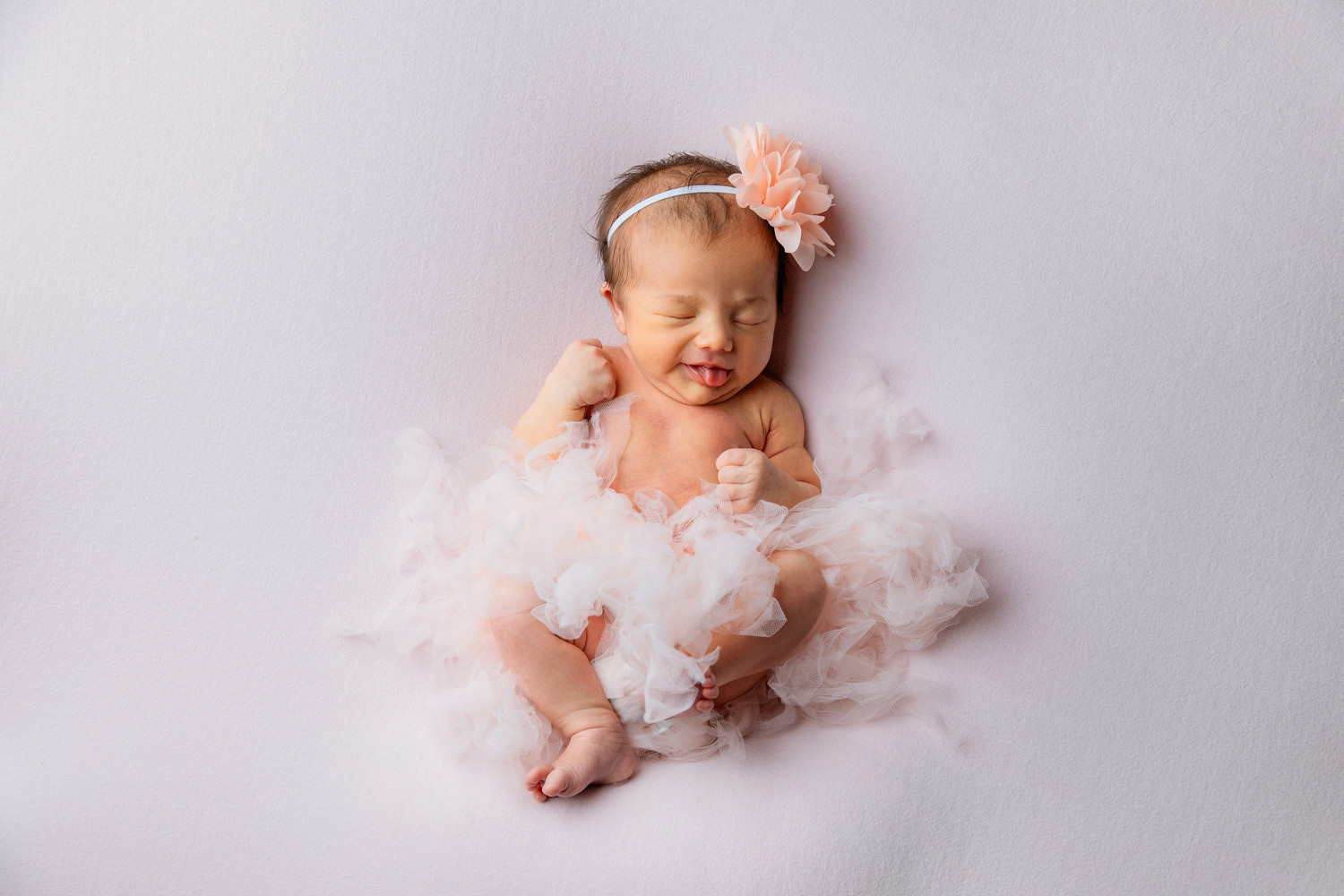 Newborn baby portrait session in Canberra captured by Olia Photography, specializing in professional maternity, newborn, and family photography.