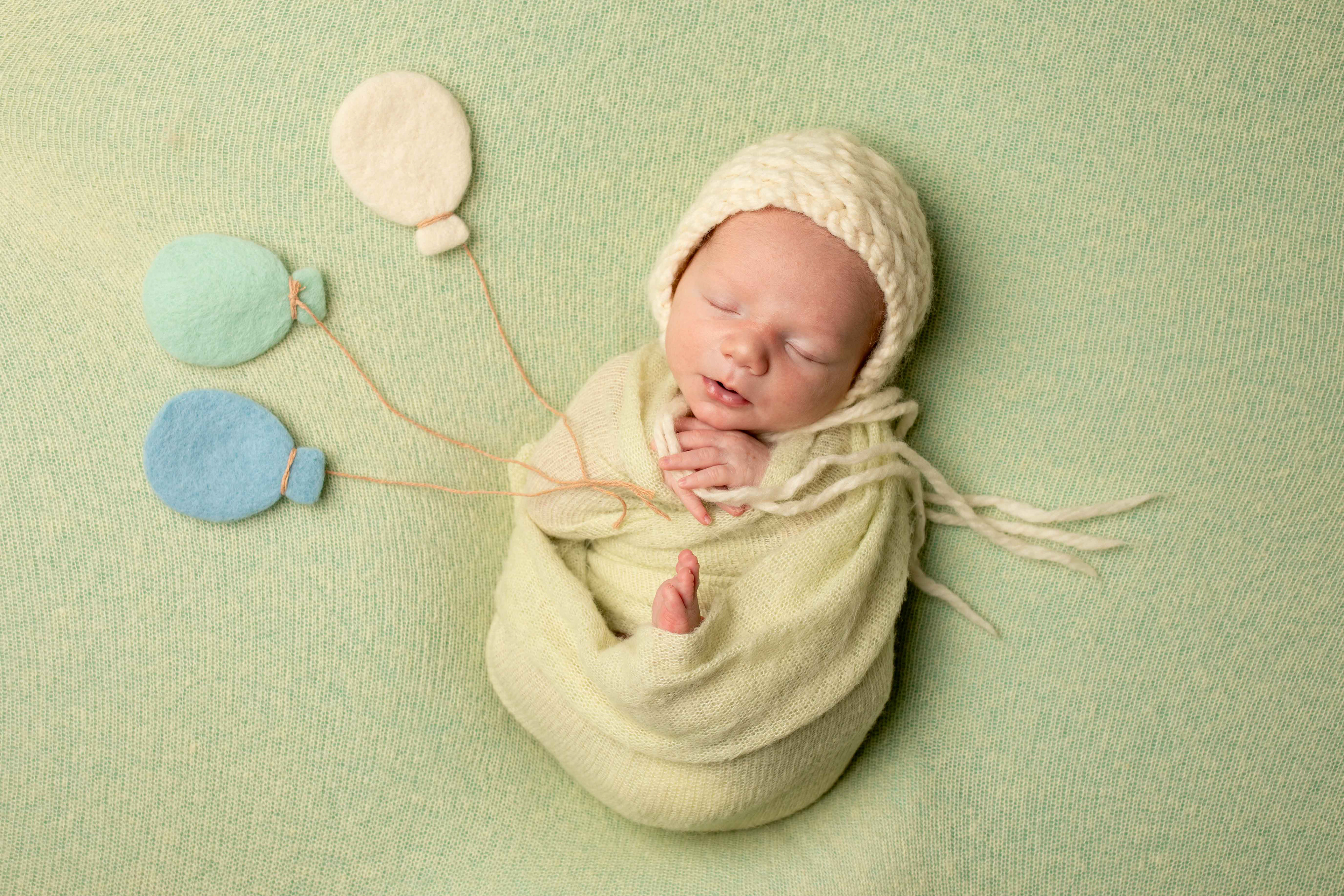 Newborn baby portrait session in Canberra captured by Olia Photography, specializing in professional maternity, newborn, and family photography.