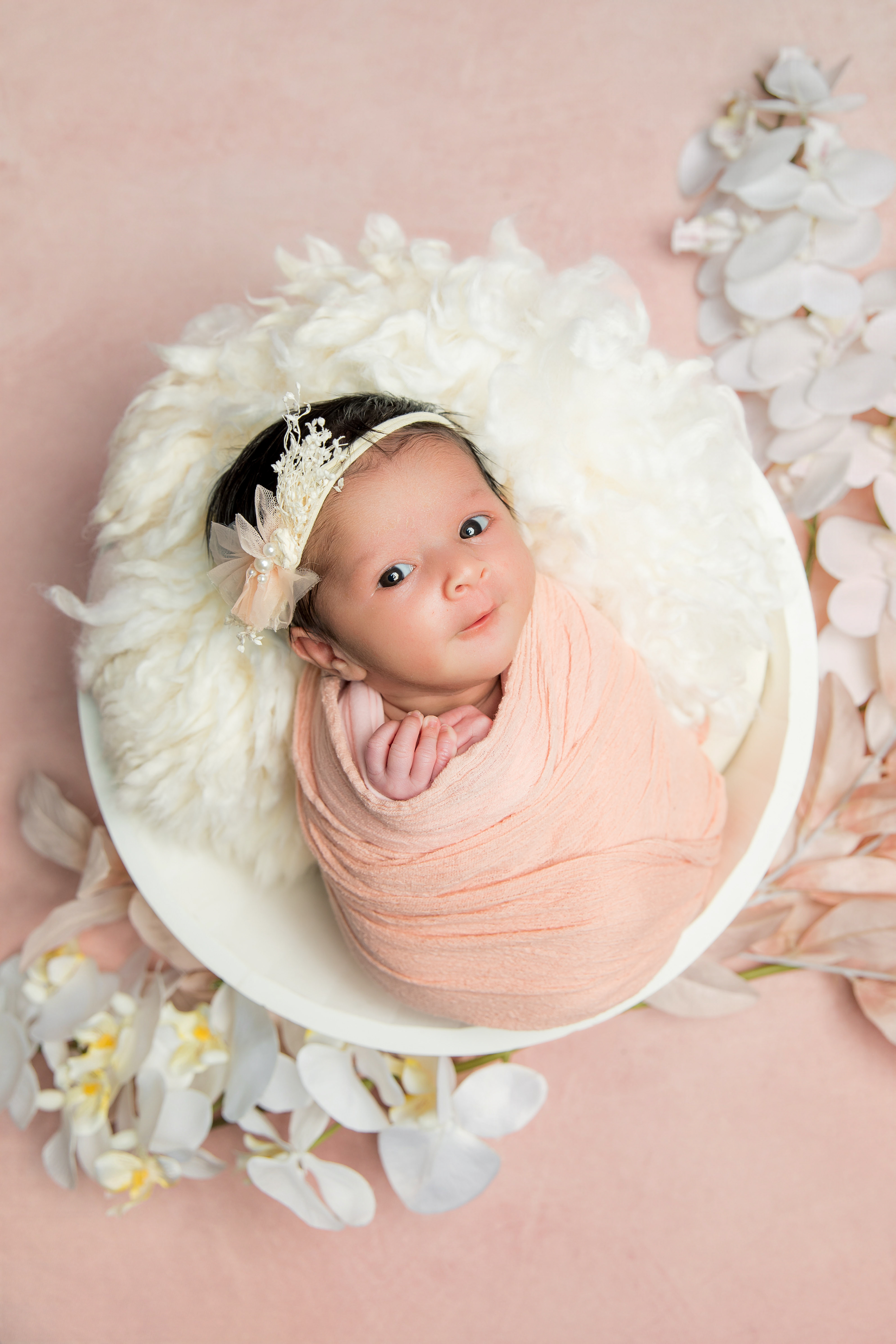 Mobile Newborn baby portrait session in Canberra by Olia Photography.