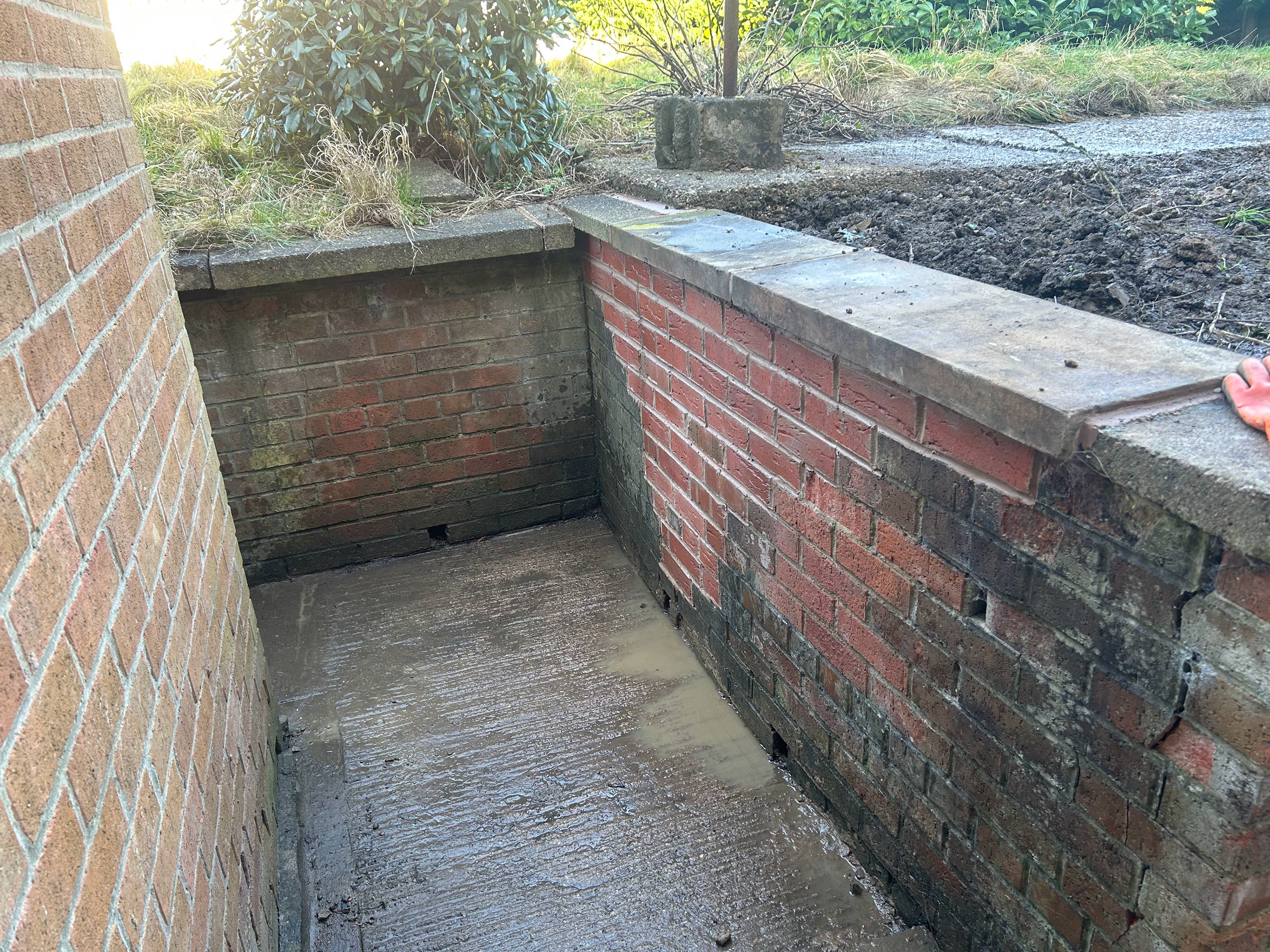 Brick retaining wall repair