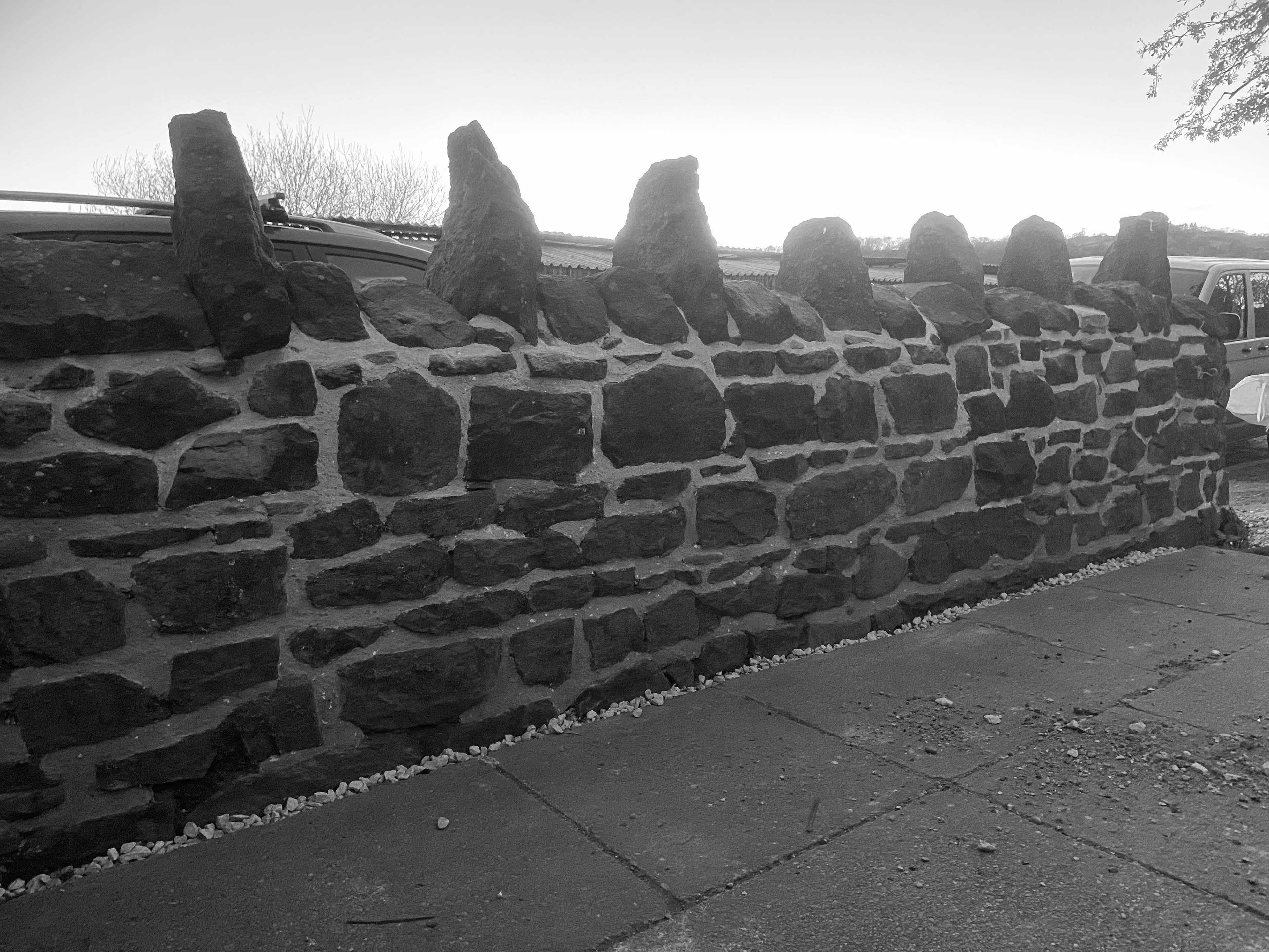 Repointed gritstone garden wall