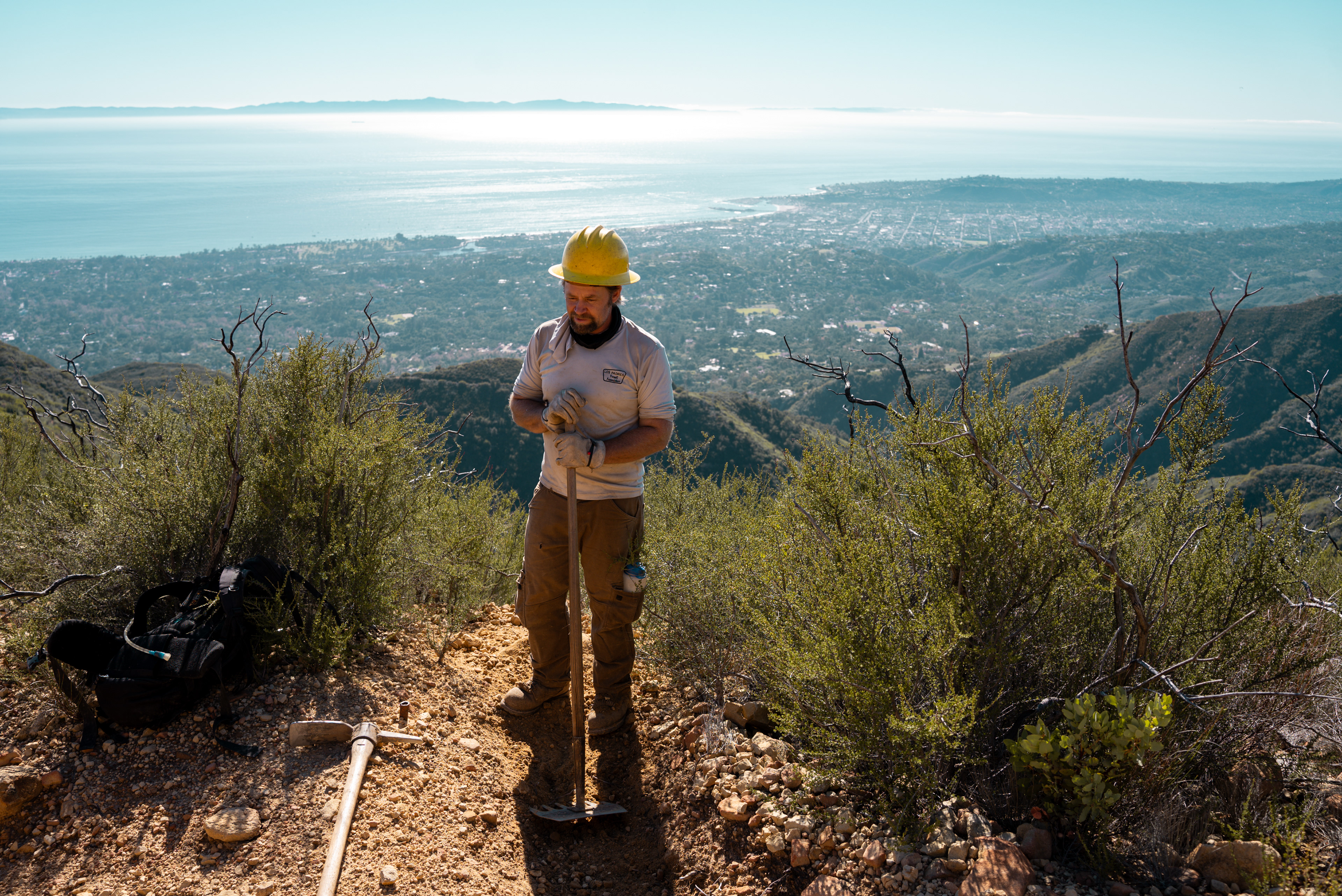“You got to have a sense of humor out here” says Tom Baughman as he jokes about how digging drains gets repetitive along the Cold Springs Trail in Montecito, California, Sunday, Nov. 23, 2025. (Photo/Aston Smith)