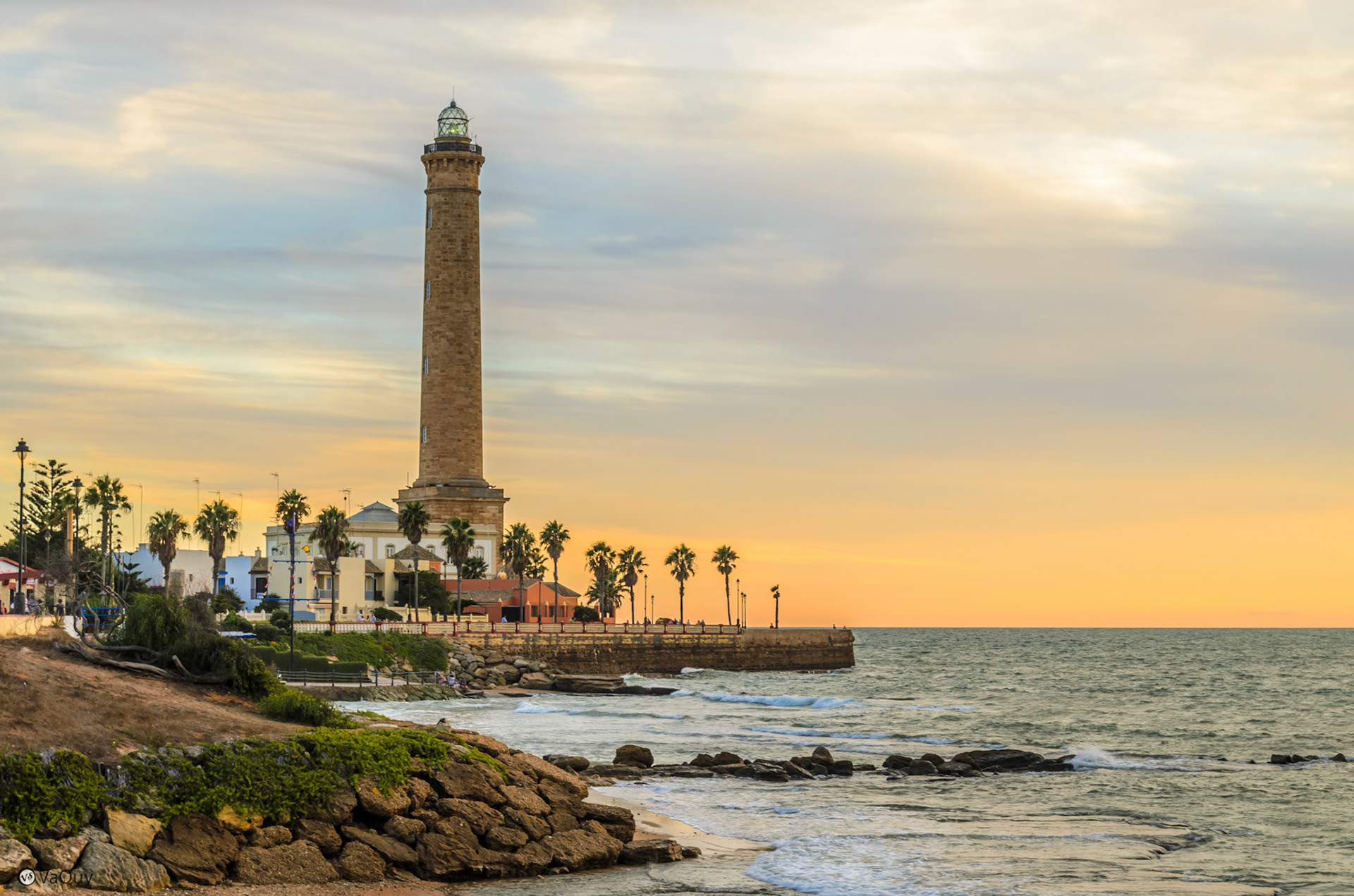 Chipiona lighthouse from Las Canteras beach, in a beautiful sunset.