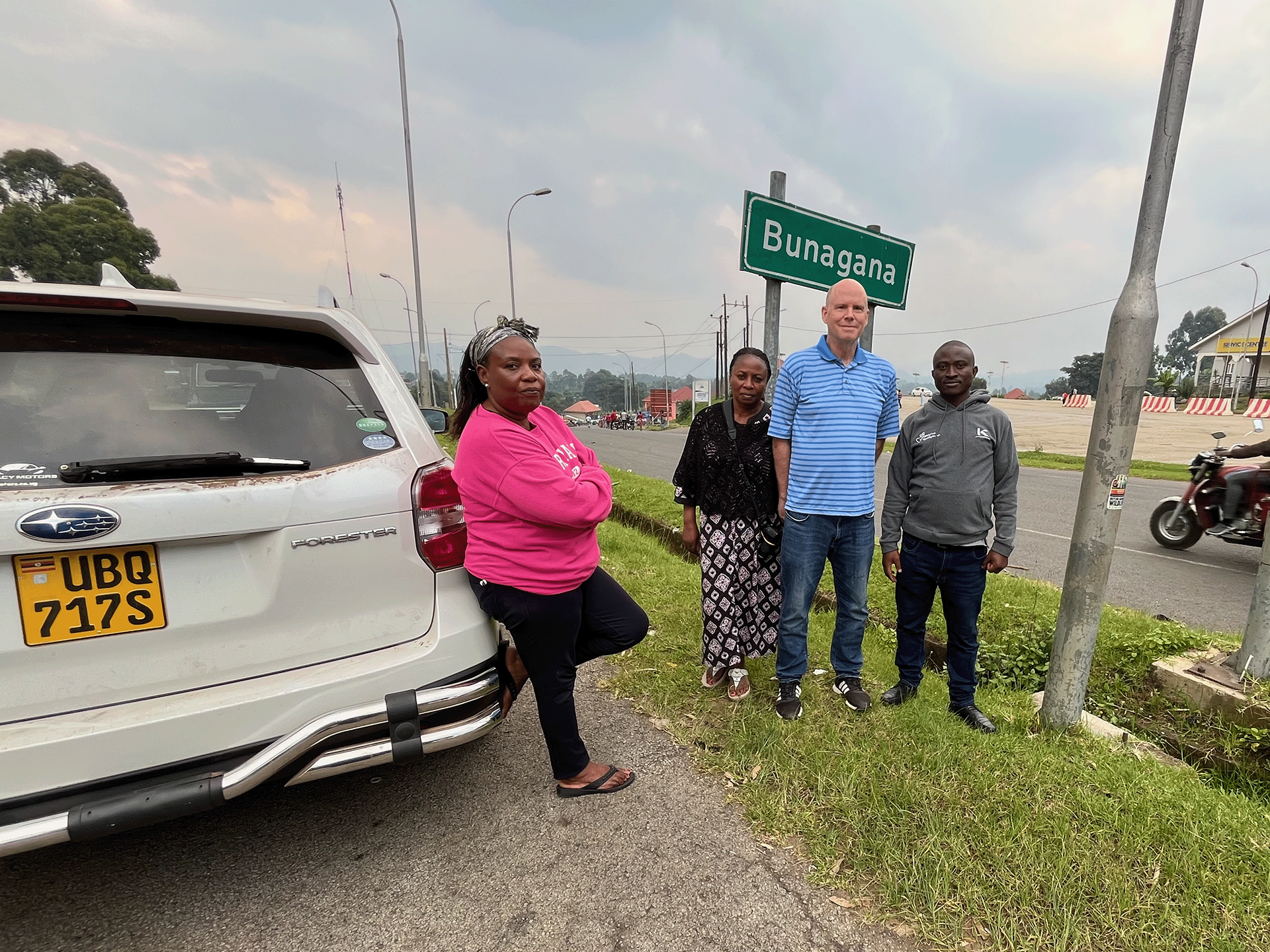 Doro, Muja, Geoff, and border guard at DRC Border