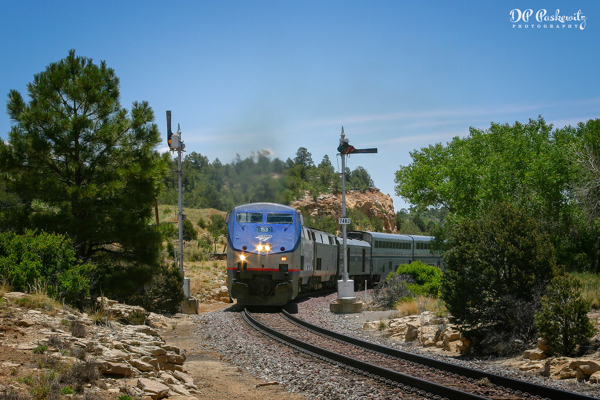 Train No. 3 Nearing Watrous: Amtrak's Southwest Chief splits the semaphores at MP 748.2 just east of Watrous, NM, 2004