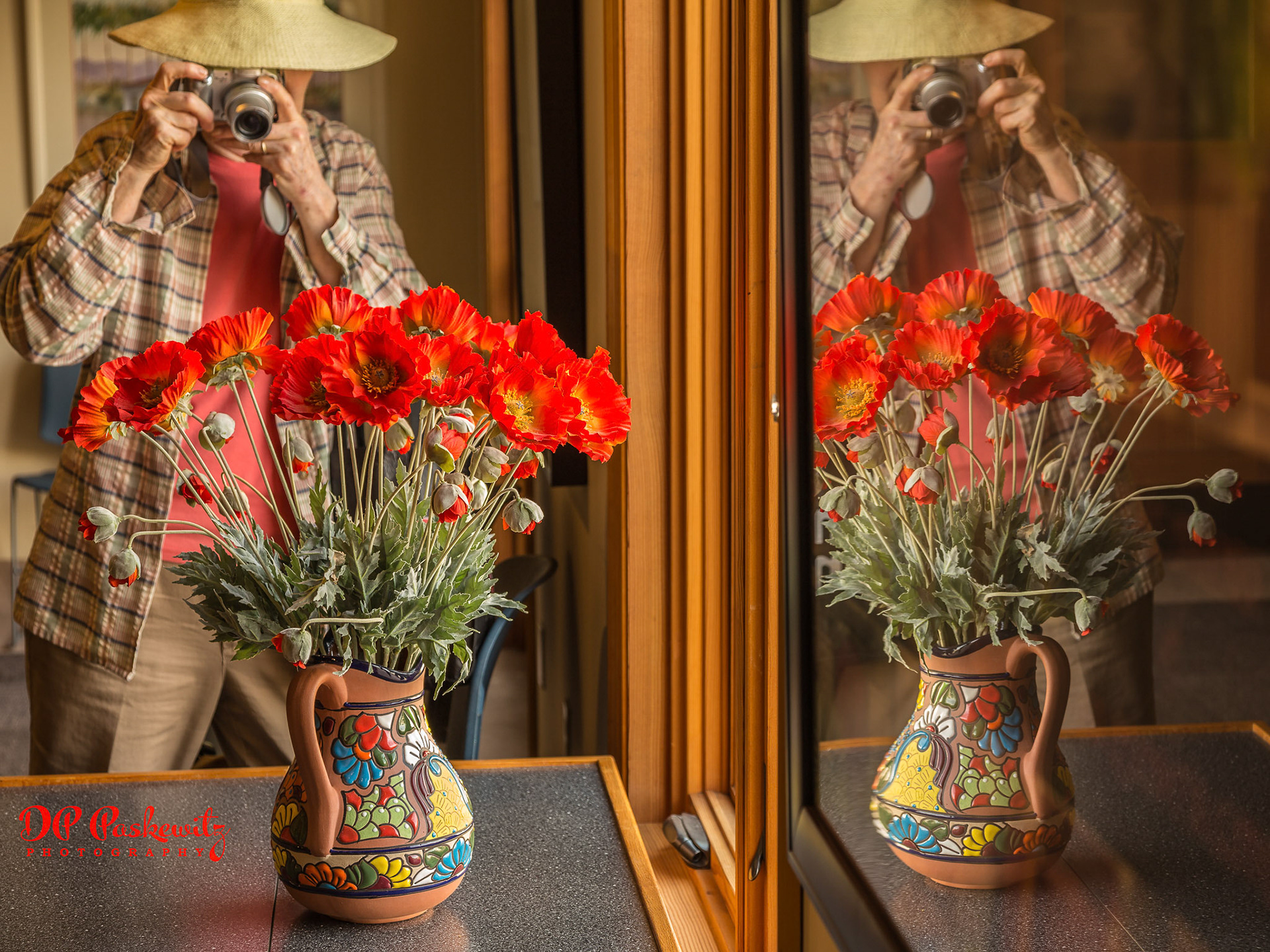 Pale Reflection: A woman photographs a vase of flowers at the La Quinta Museum, La Quinta, CA, 2015